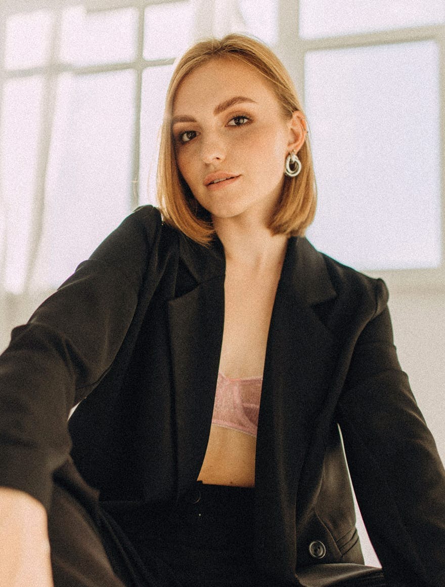 Woman with short blonde hair