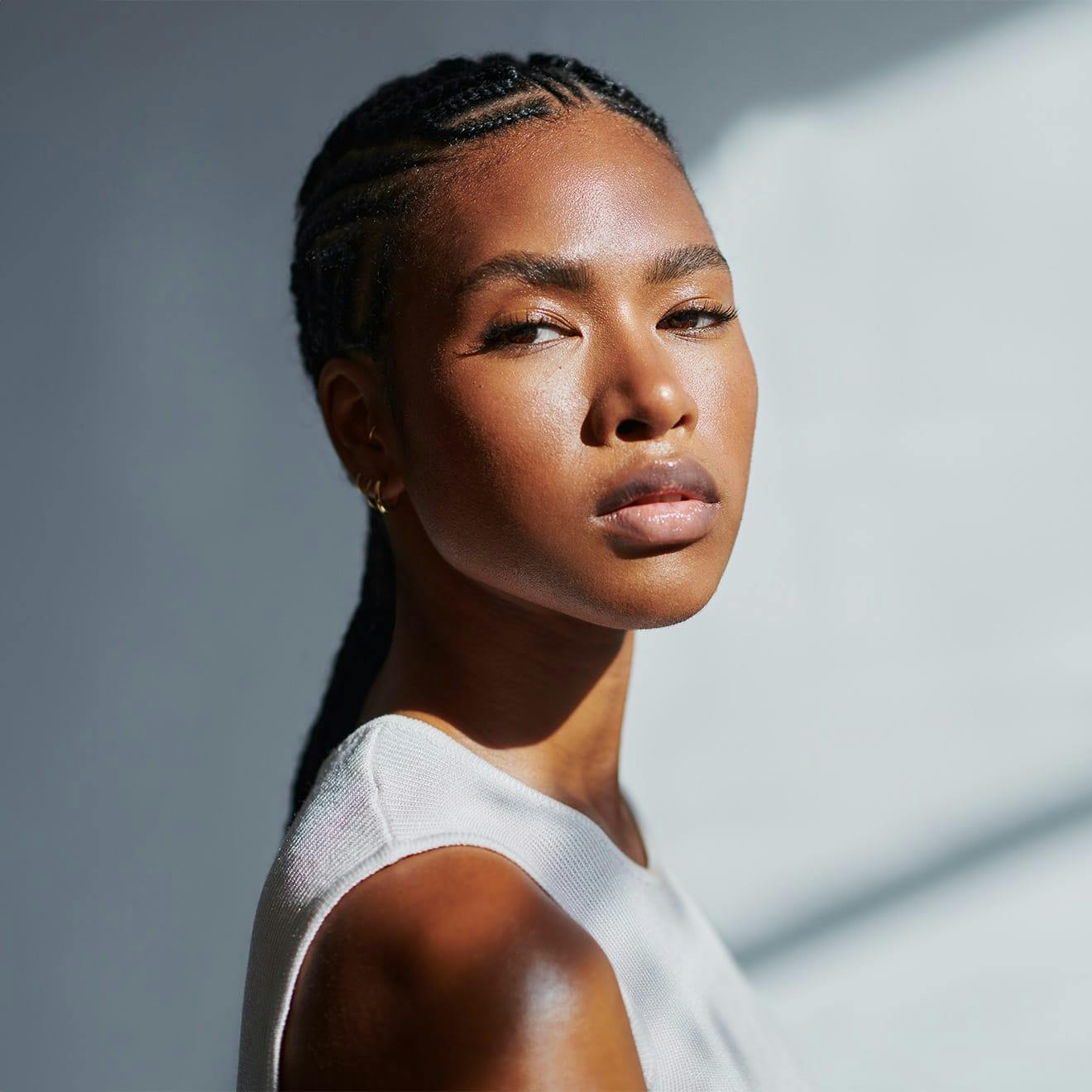 woman looking over her shoulder