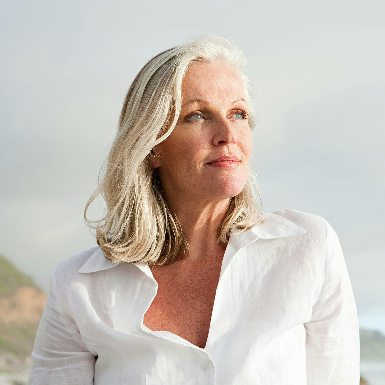 woman standing on a beach