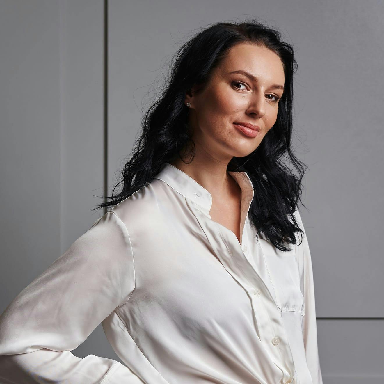 woman with her hand on her hip