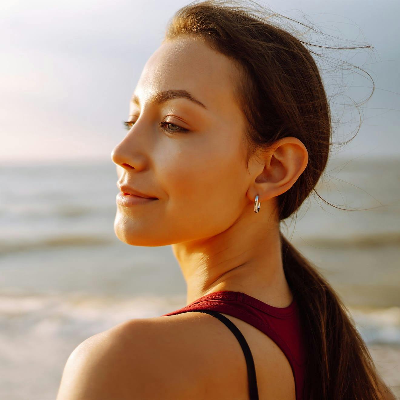 woman standing on a beach