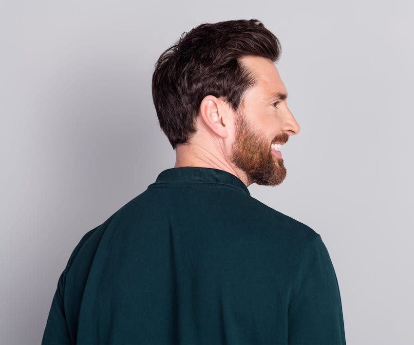 man looking over his shoulder