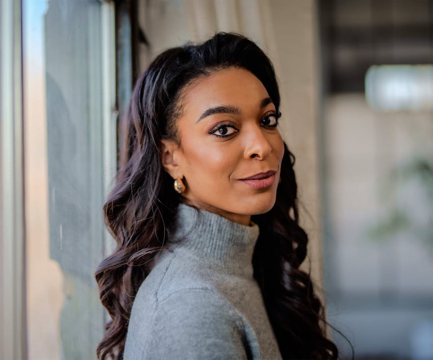 Woman looking over her shoulder