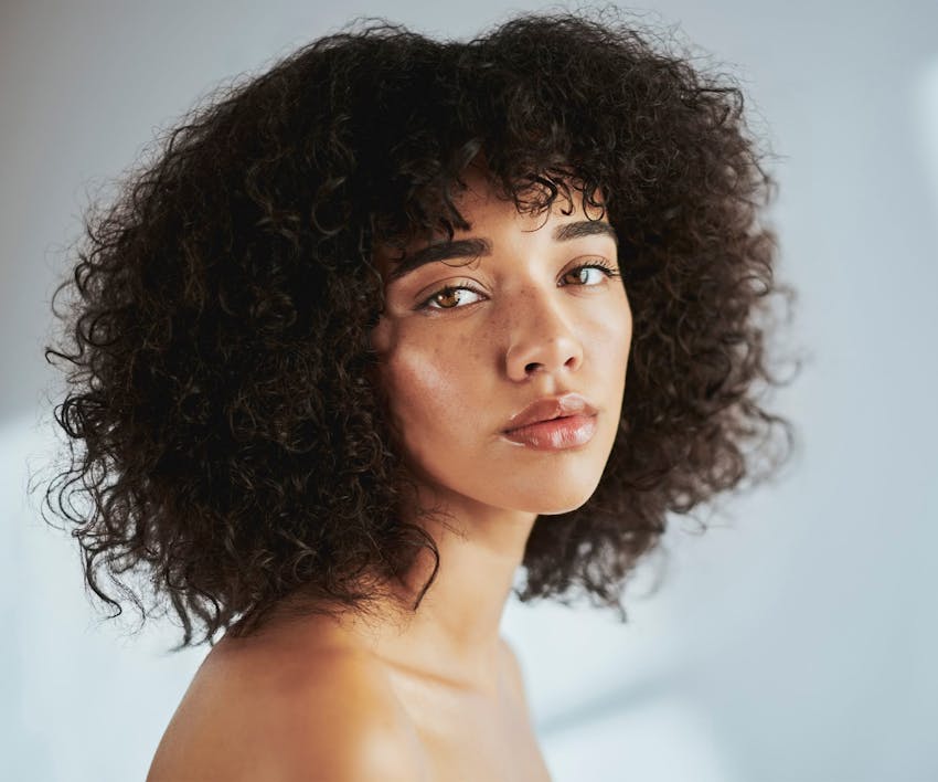 Woman looking over he shoulder