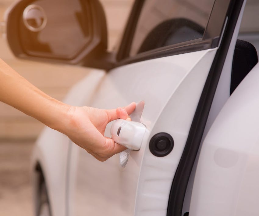 woman opening a car door