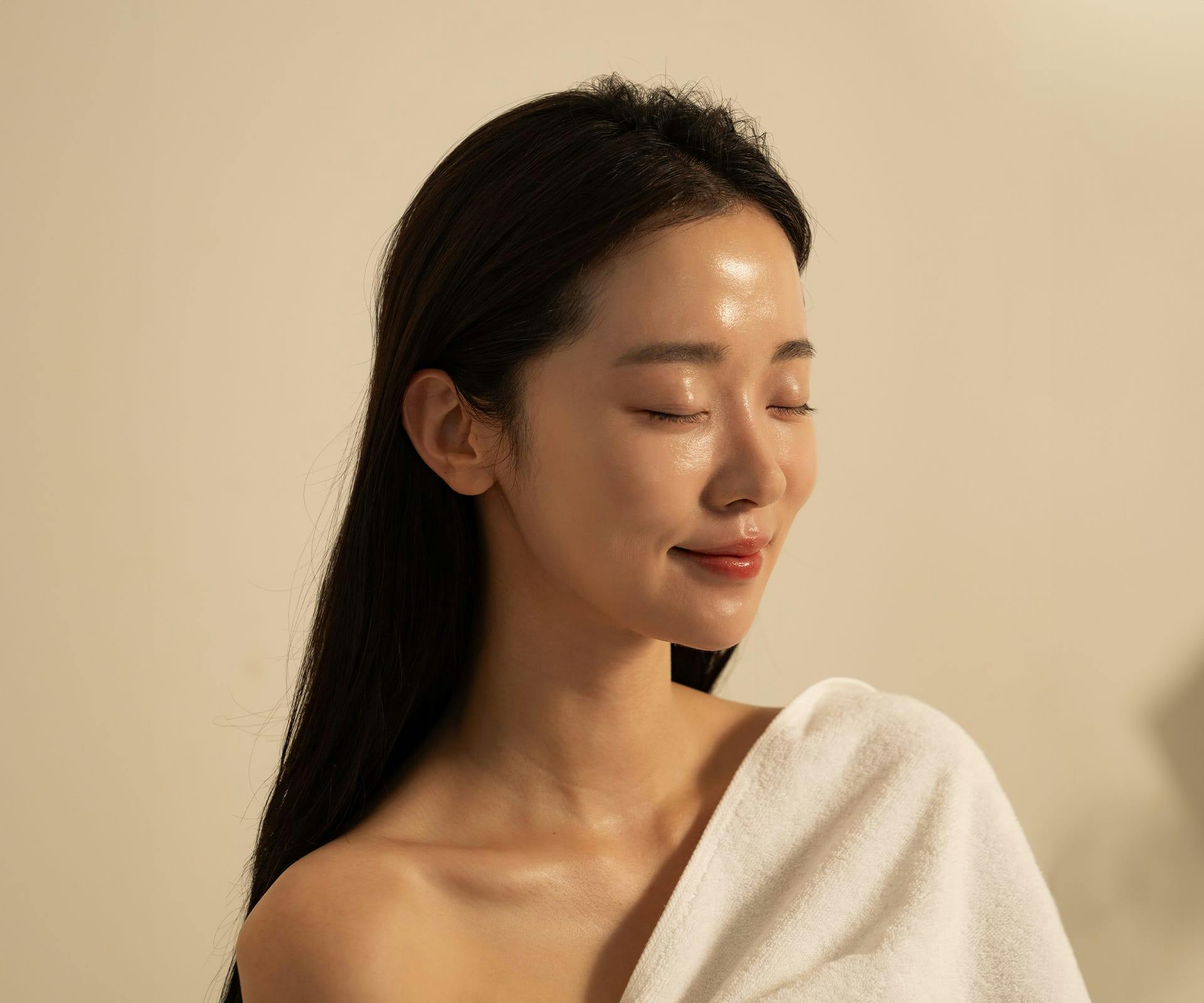 Woman with her eyes closed