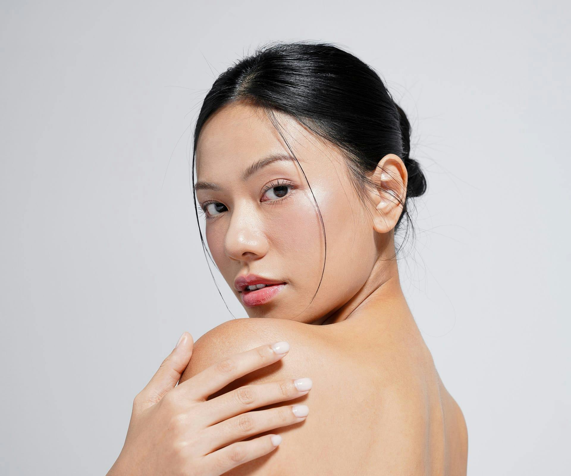 Woman looking over shoulder