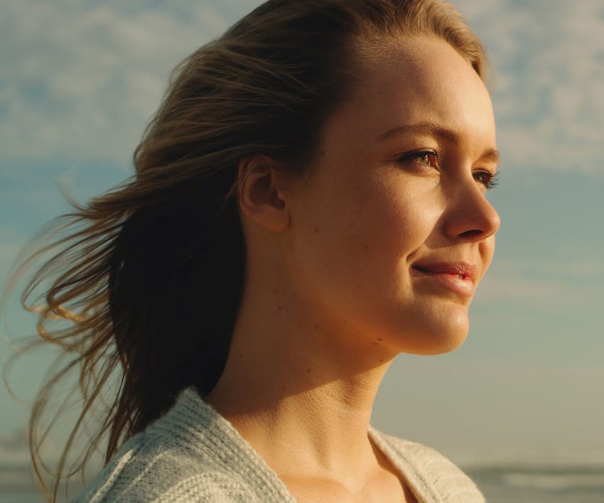 woman standing on a beach