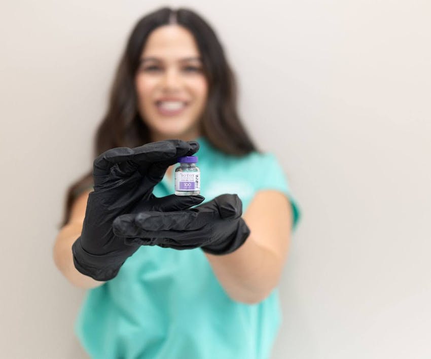 woman looking over her shoulder