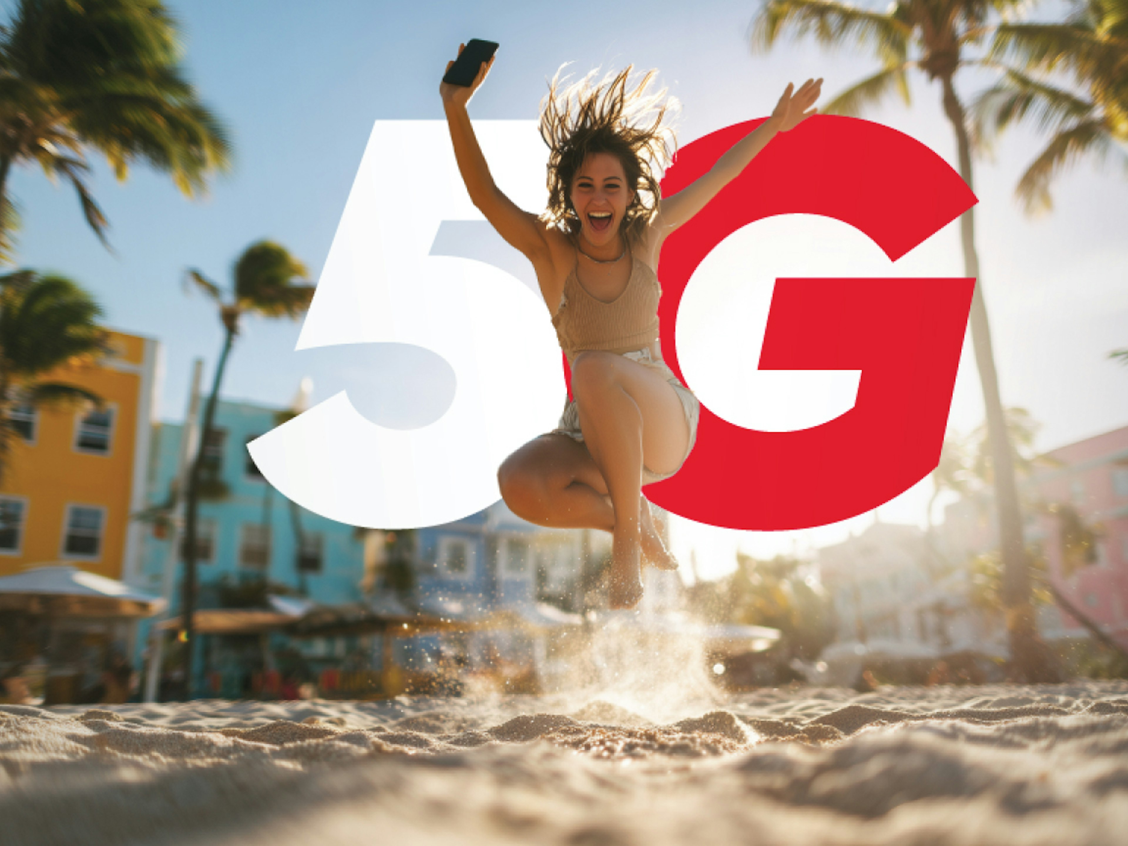 Lady celebrating 5G on the beach