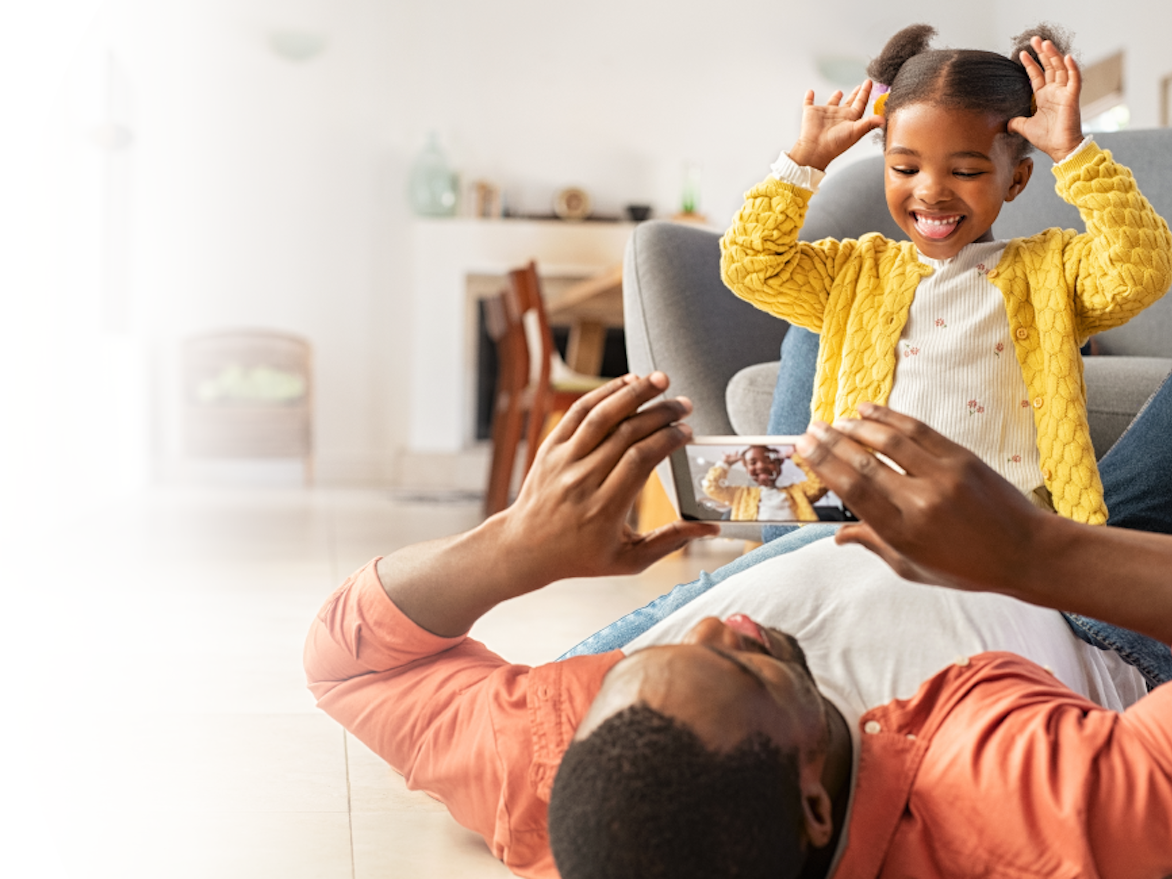 Man and daughter taking pictures