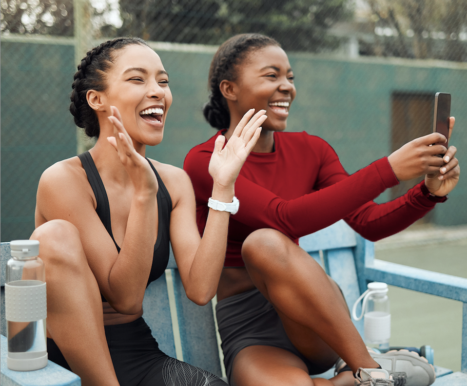 Ladies on the phone at a workout