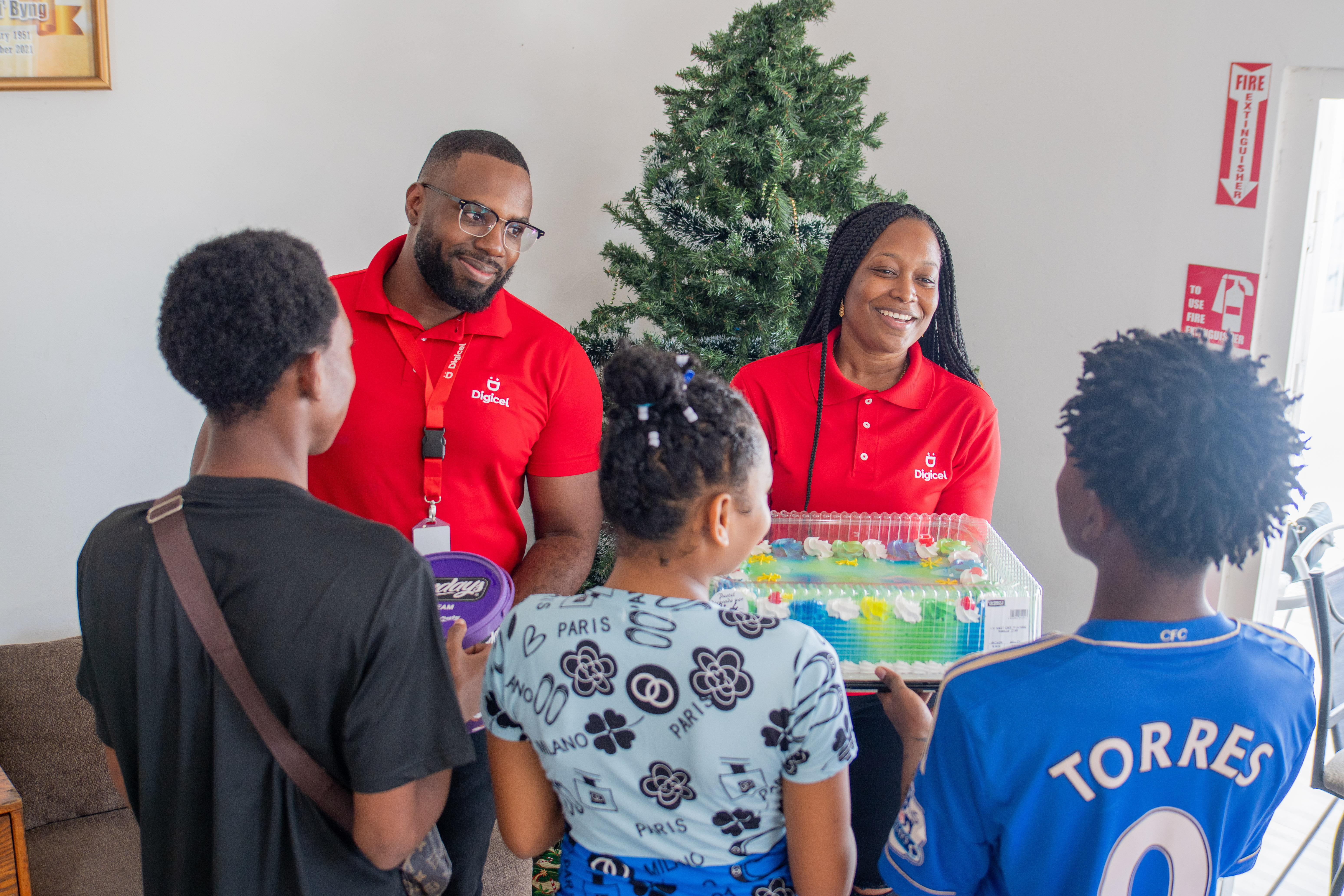 Digicel staff donate to orphans