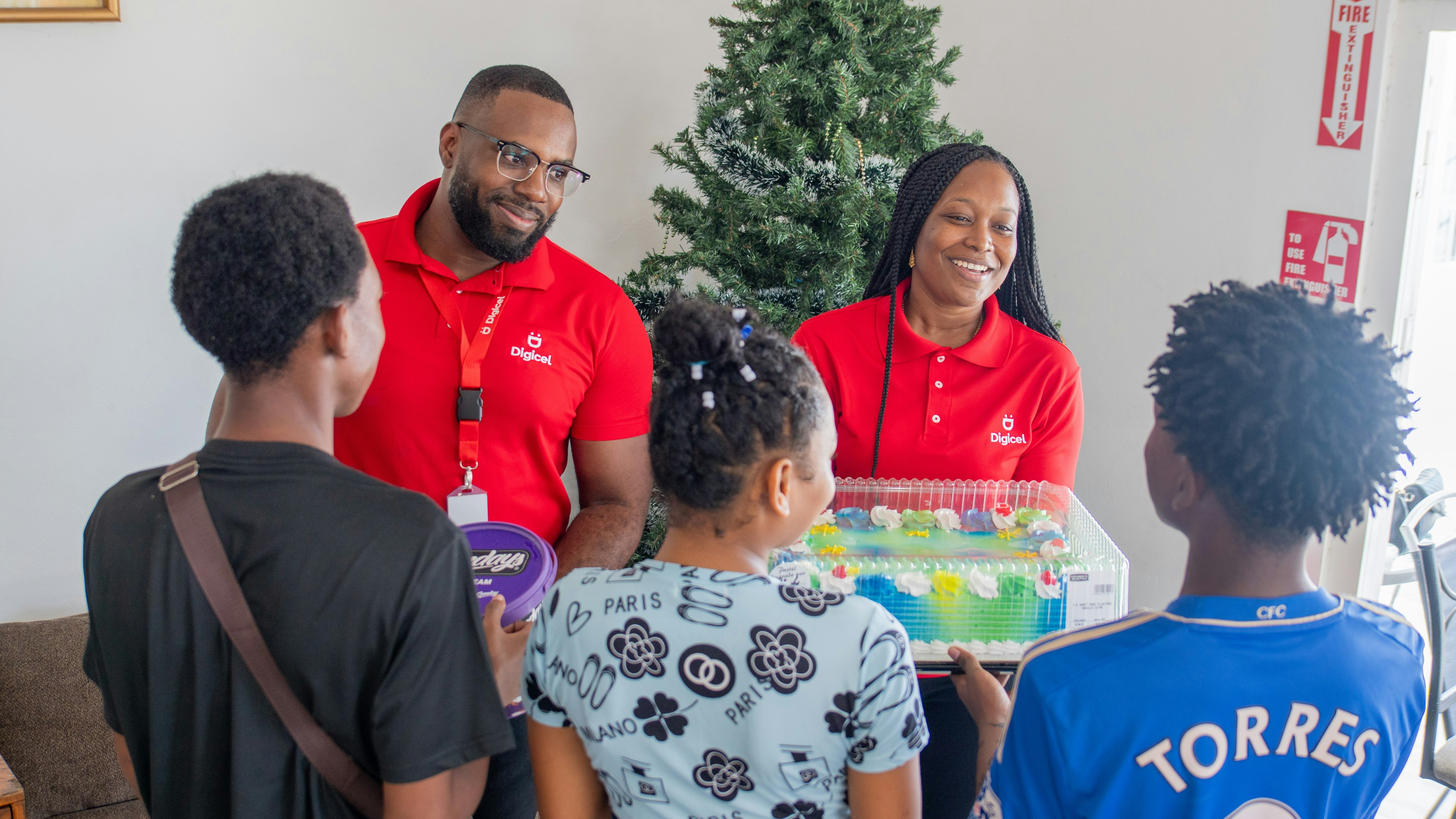 Digicel staff donate to orphans