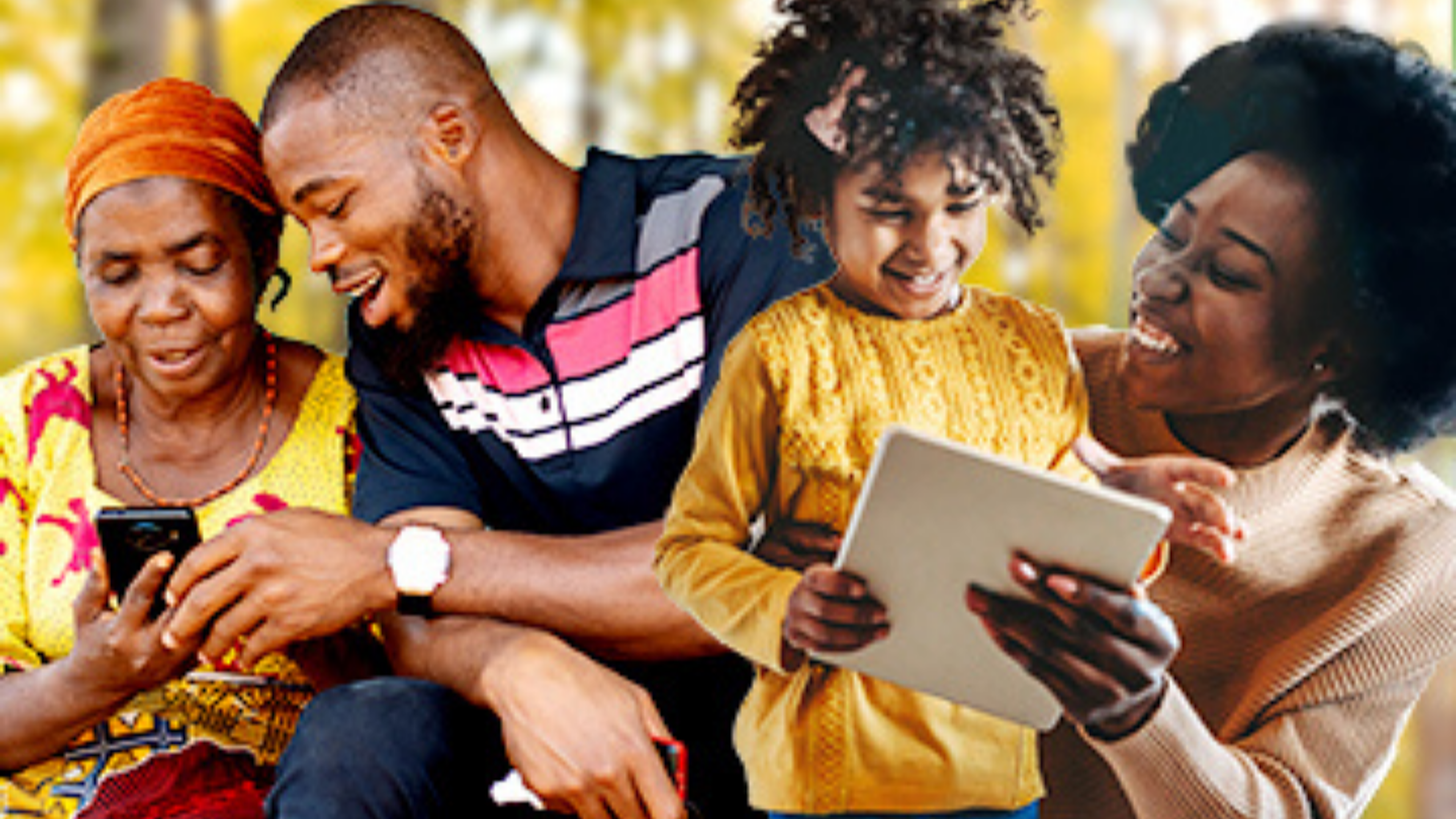 People smiling and looking at phone and tablet