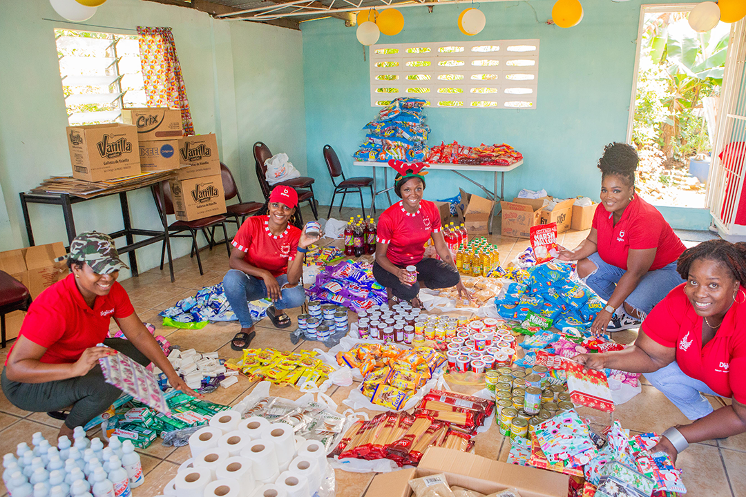 5 women with food hampers