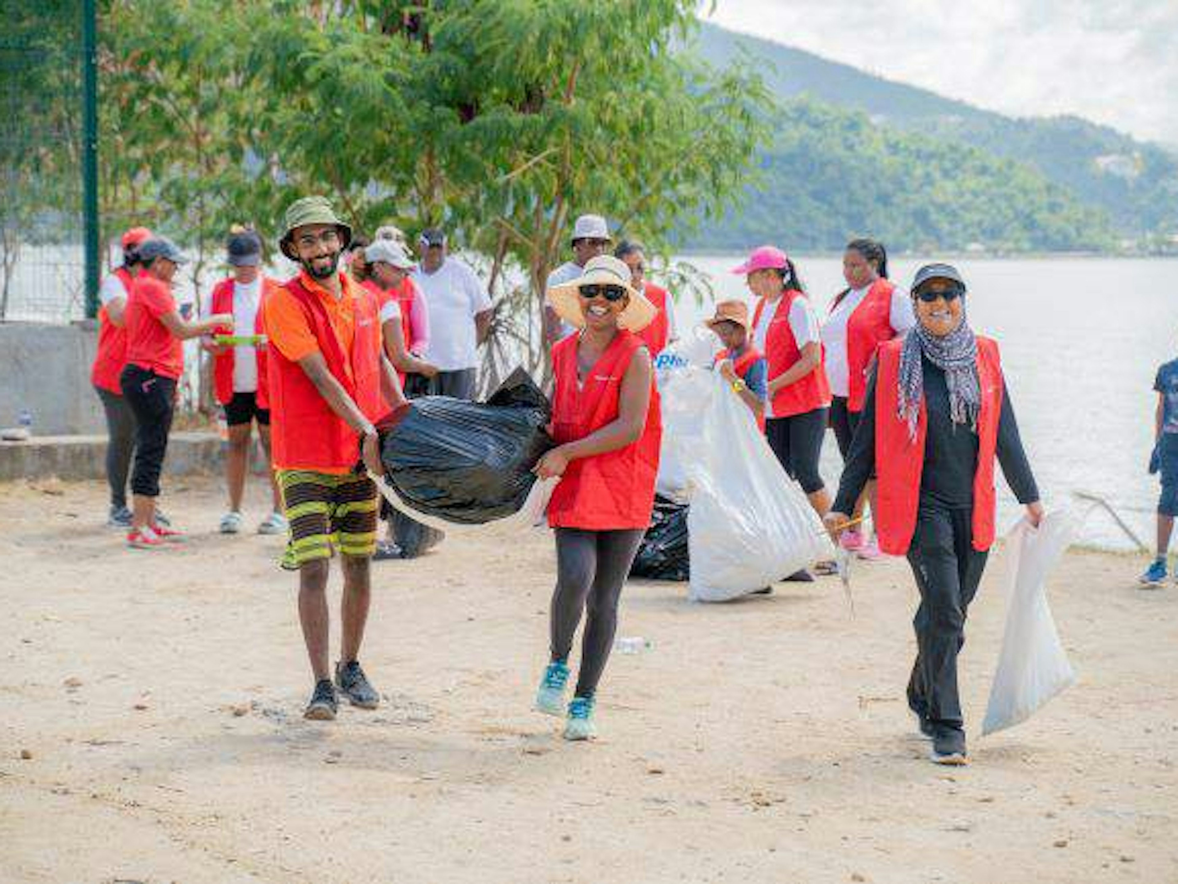 Digicel staff at a beach clean up