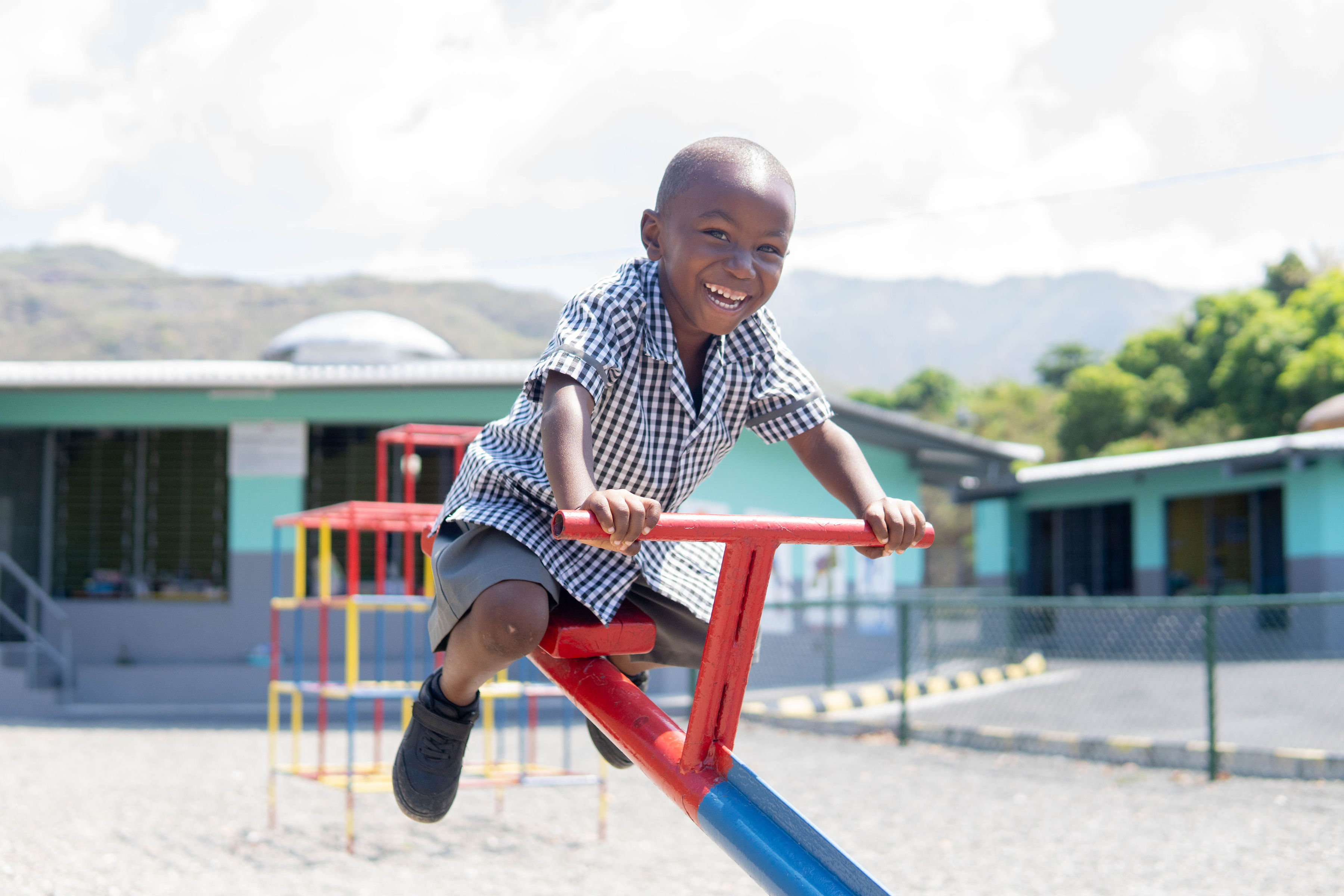 boy on seesaw