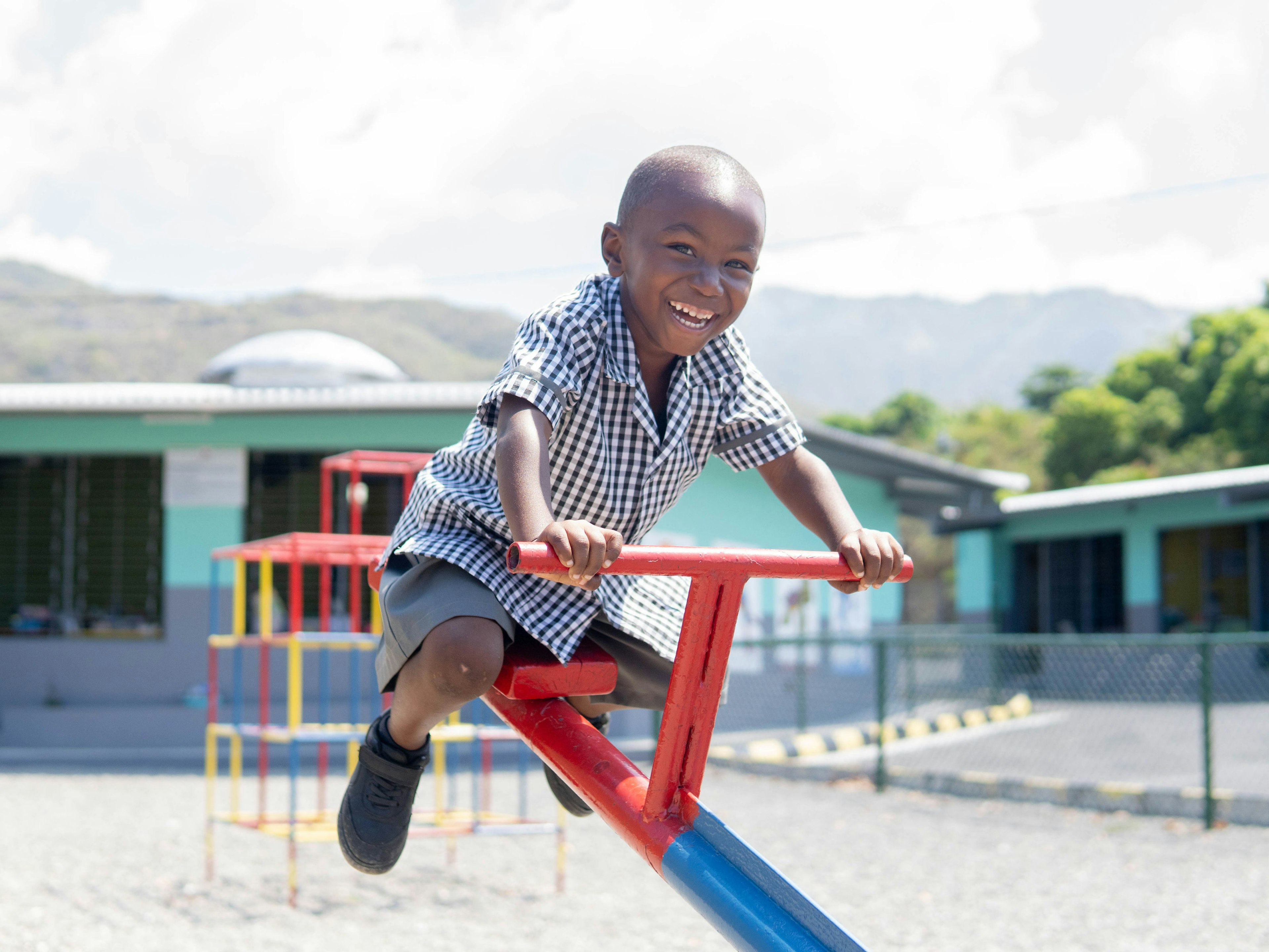 boy on seesaw