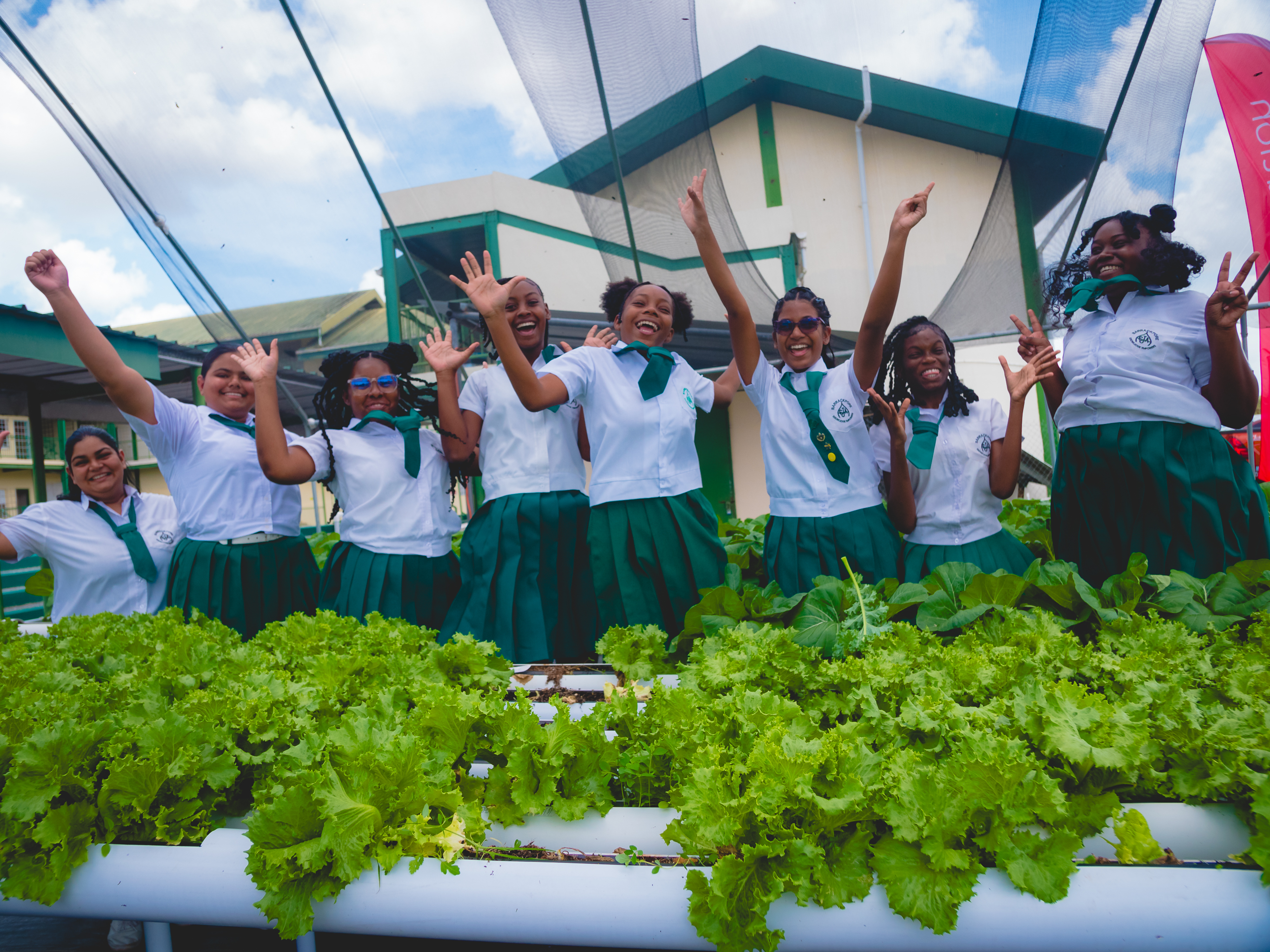 students jumping at Hydroponics site