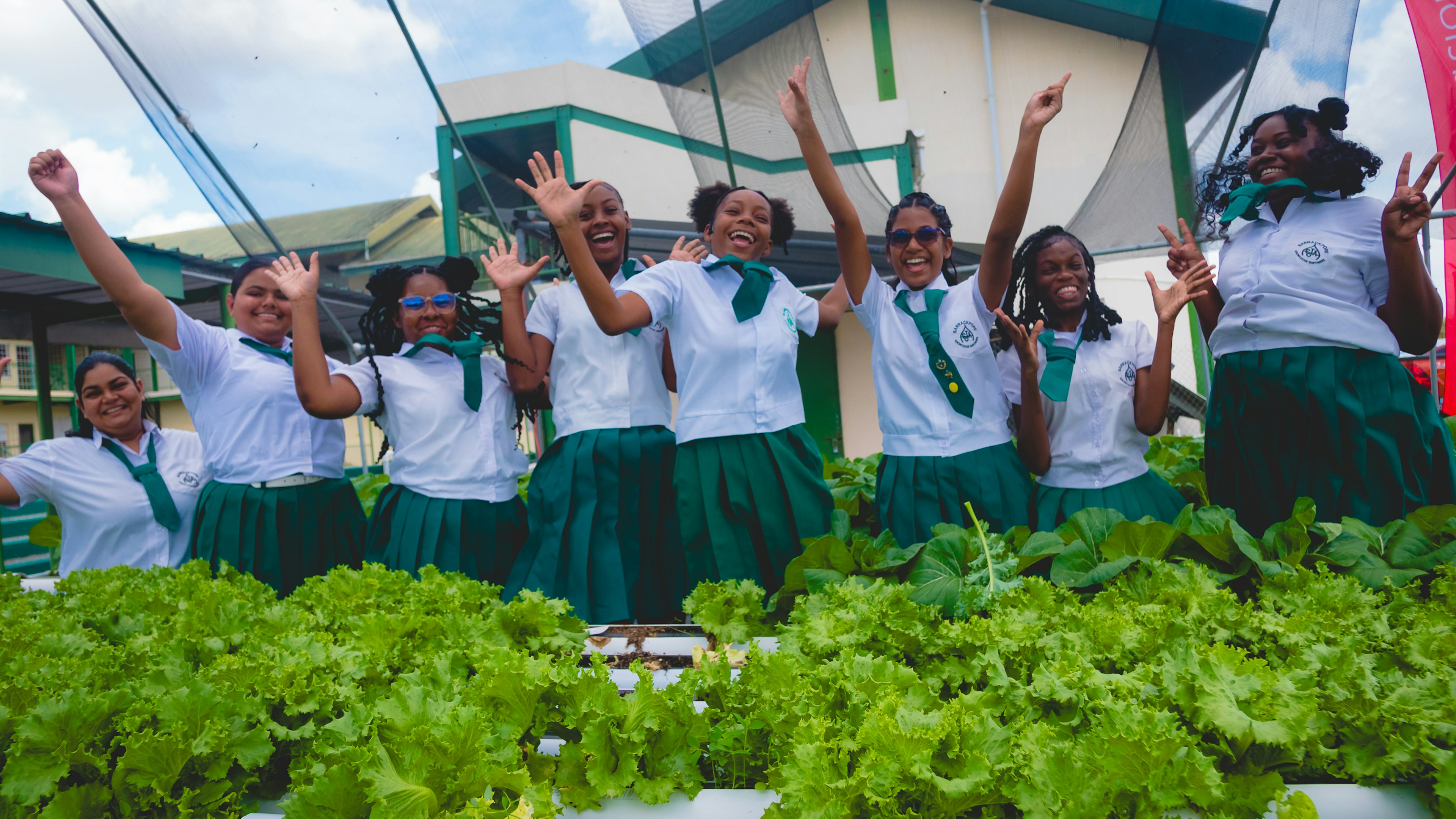 students jumping at Hydroponics site