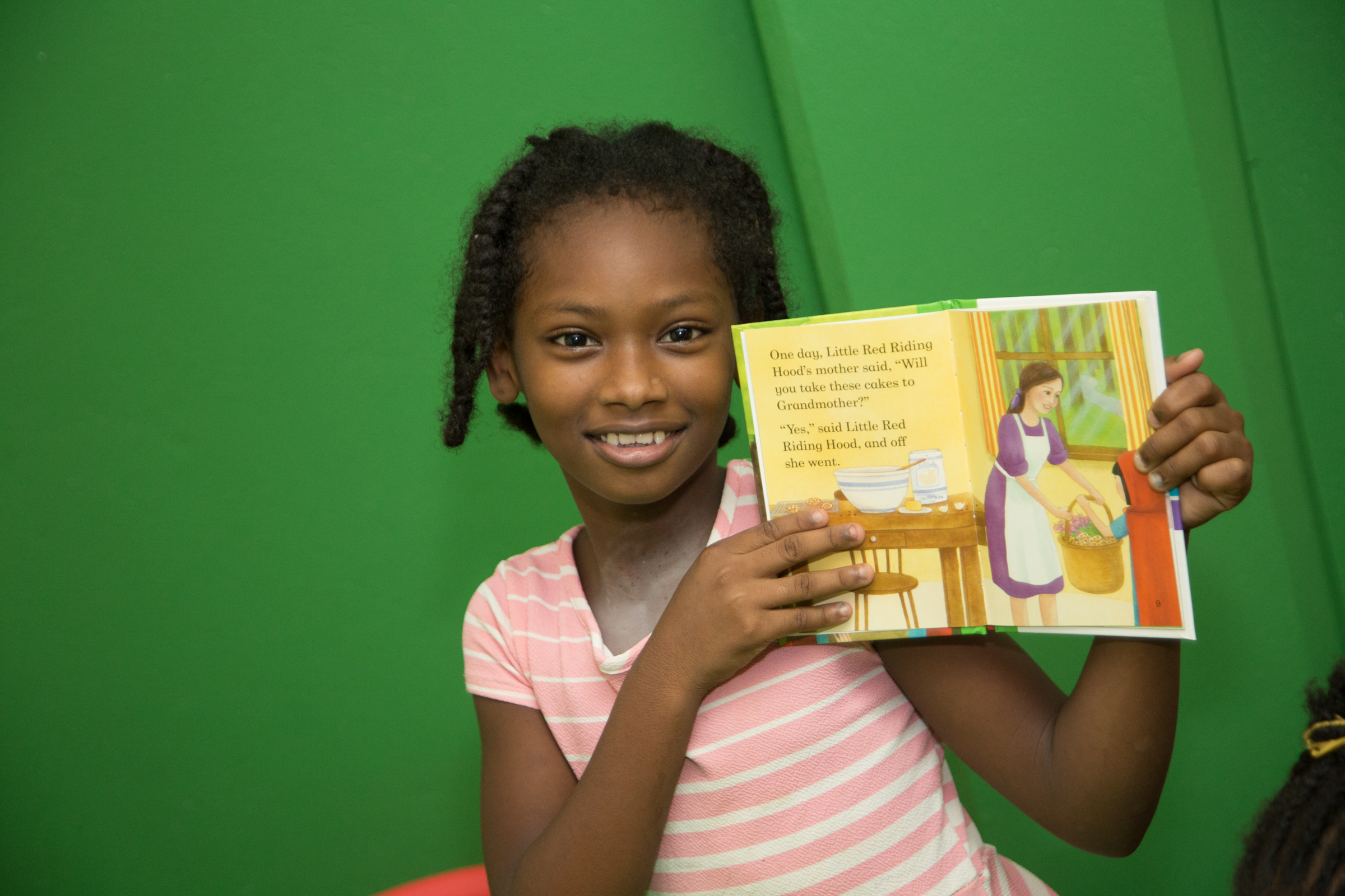 Girl reading story book