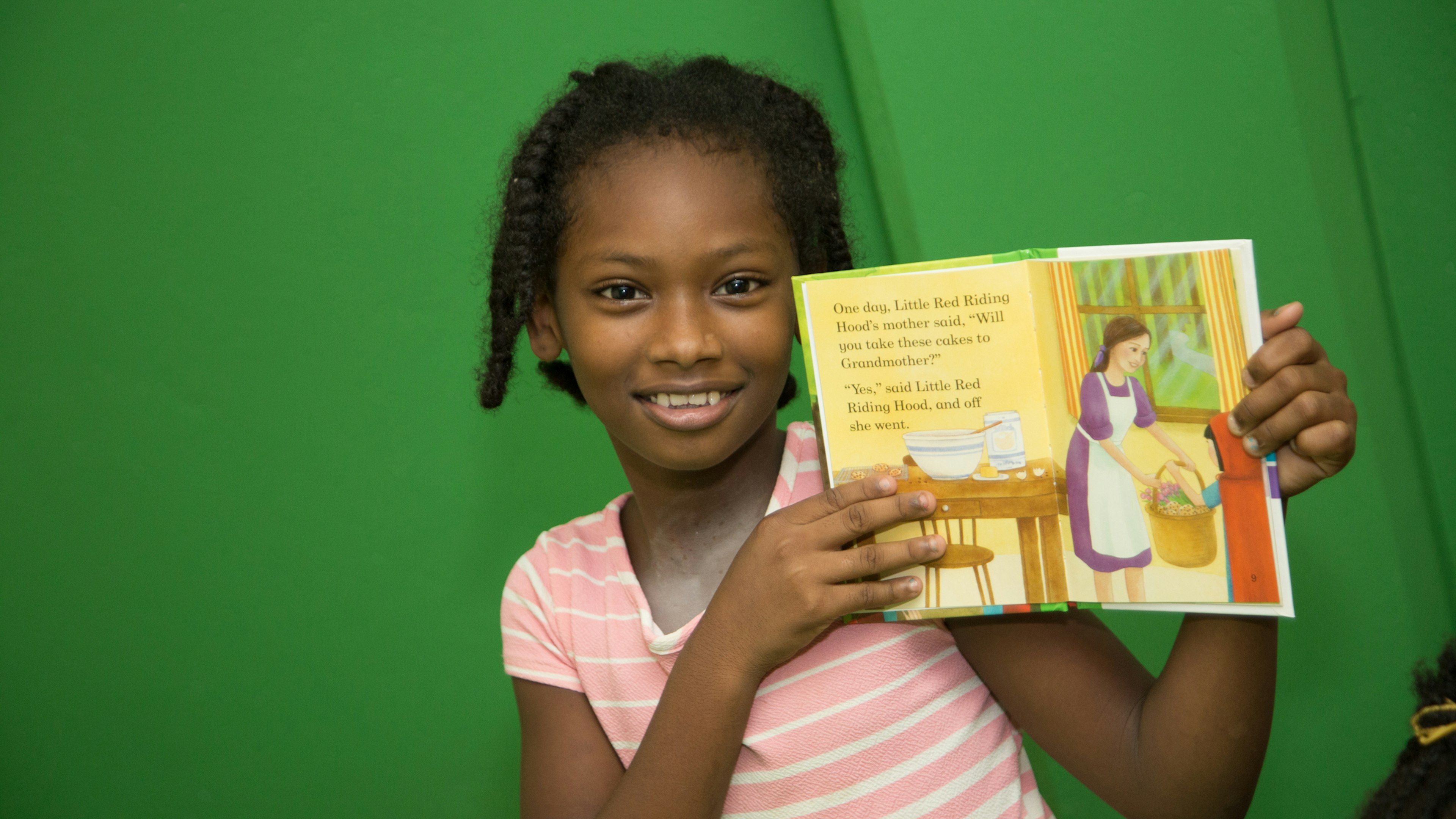 Girl reading story book