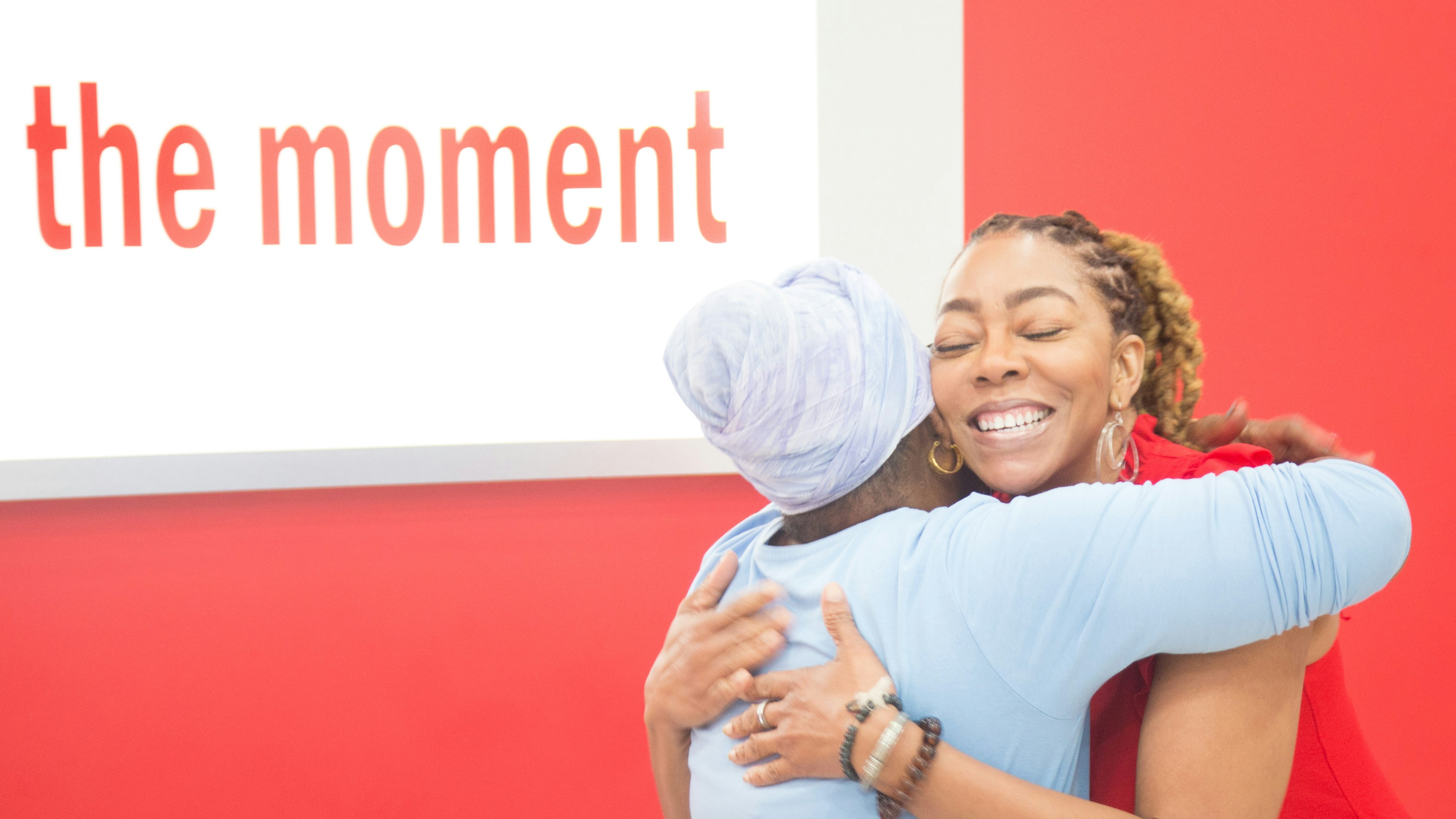 Two women hugging