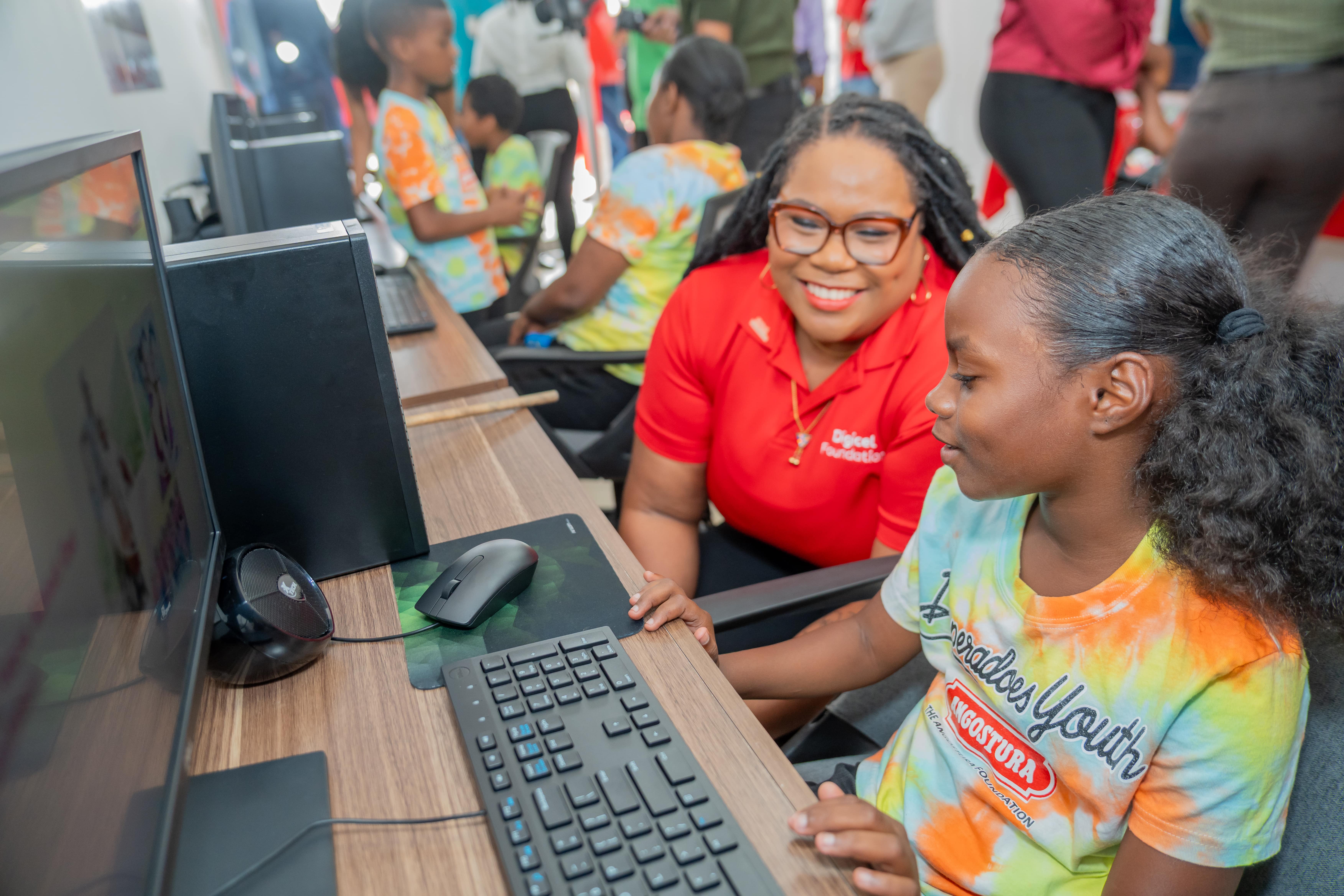 Two persons at computer