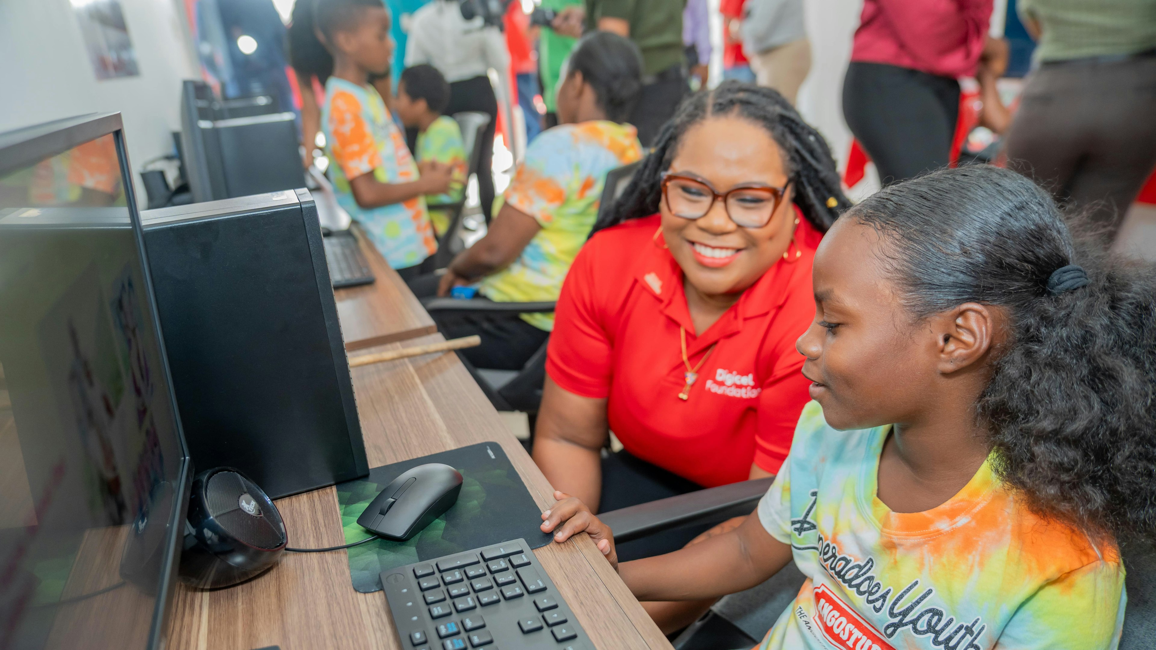 Two persons at computer