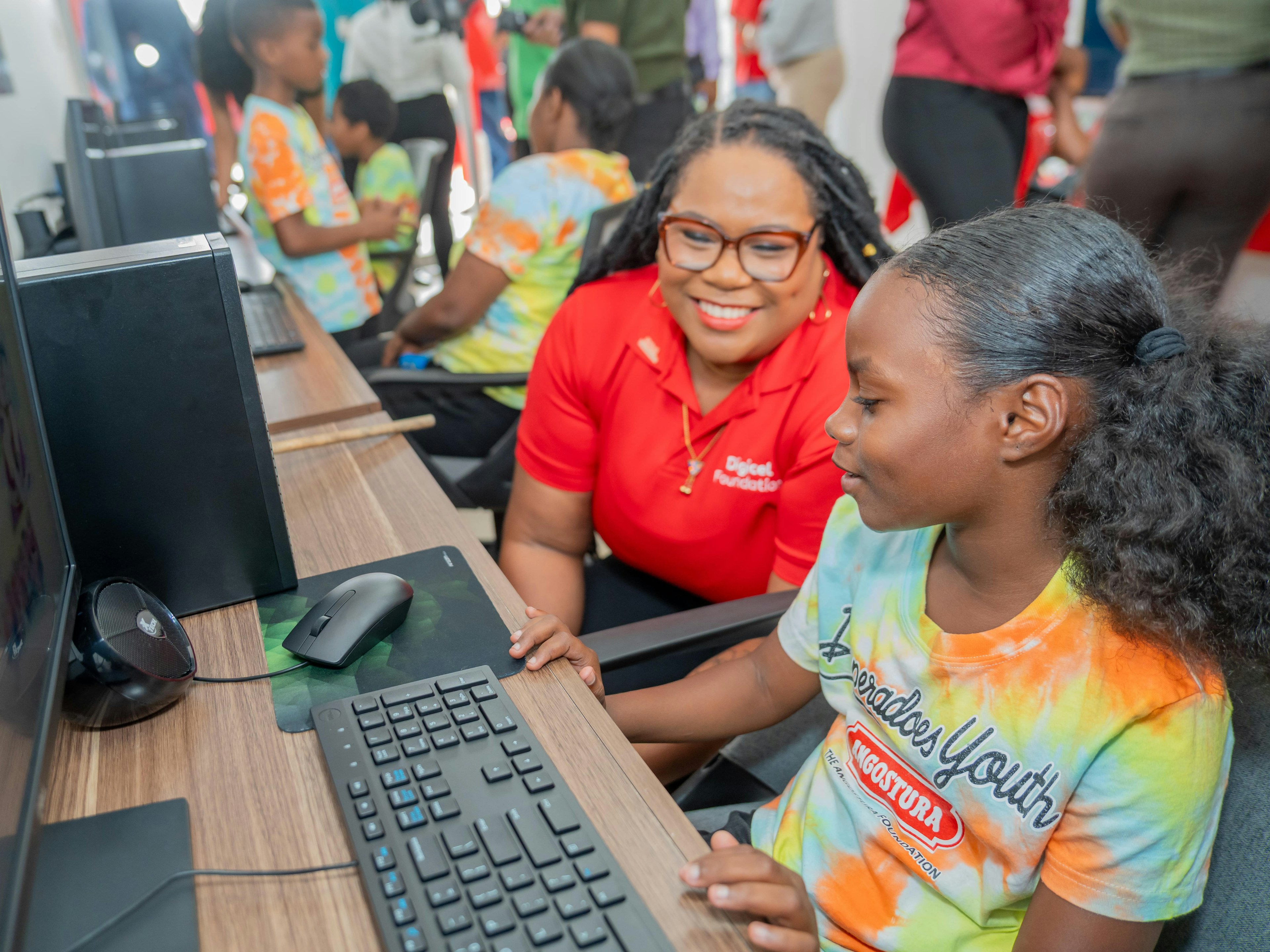 Two persons at computer