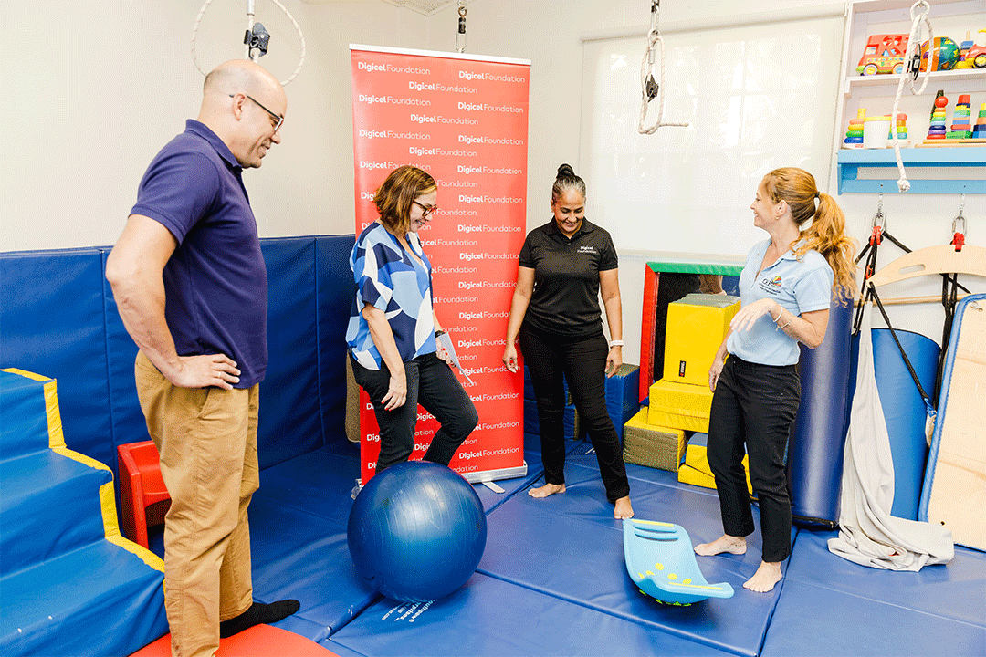 Therapists demonstrate equipment