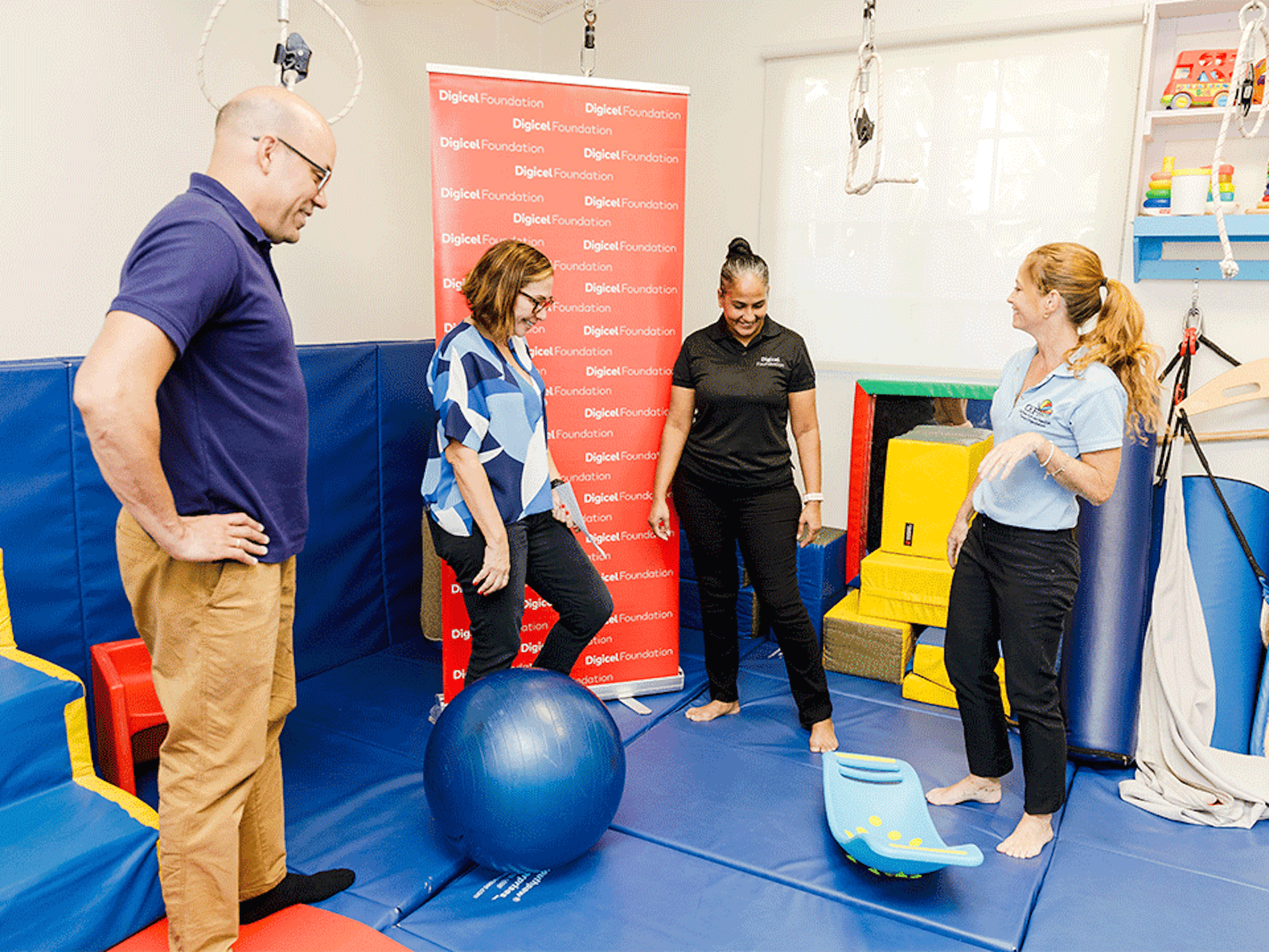 Therapists demonstrate equipment