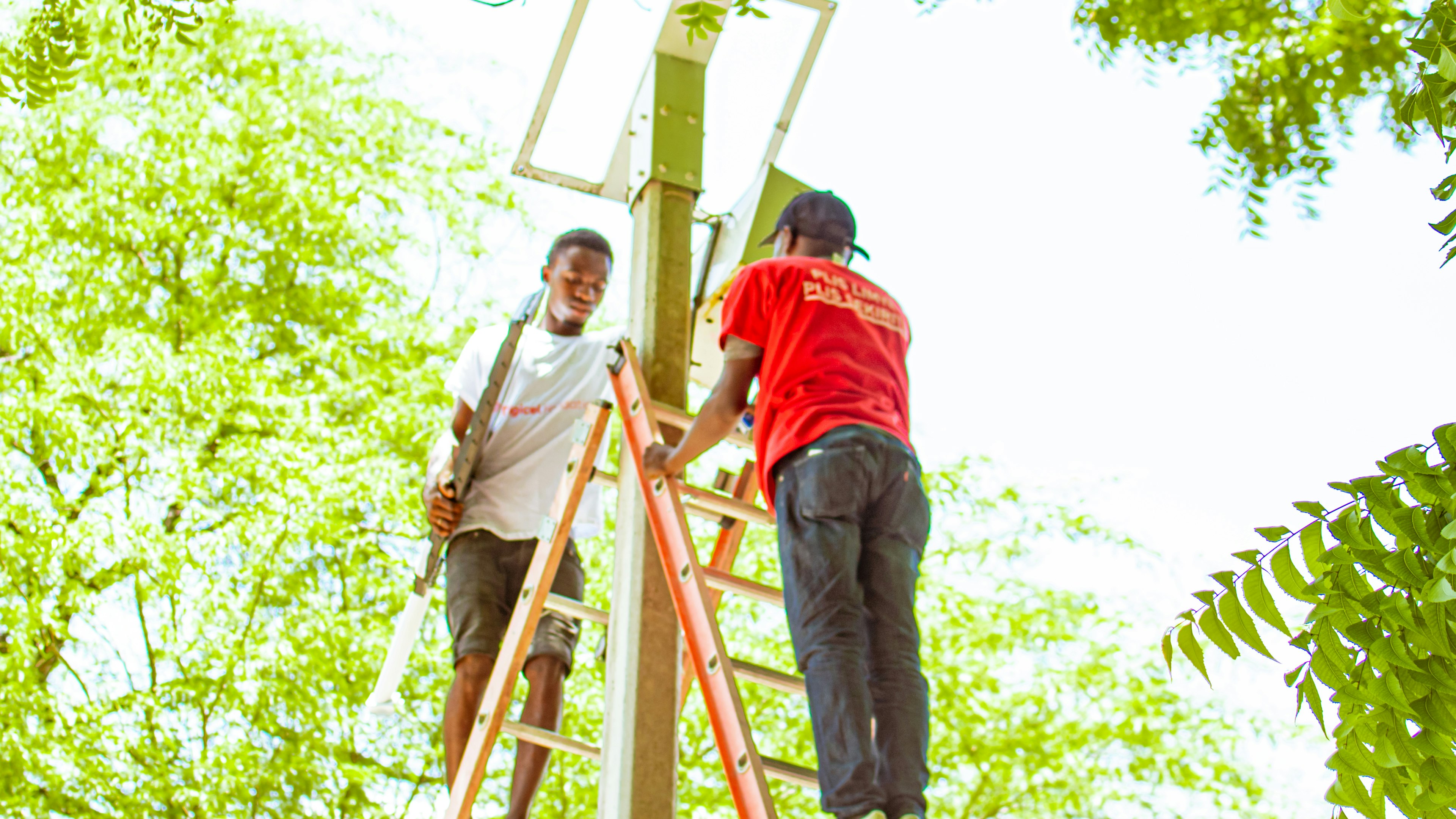 25 solar streetlights installed at Lakou Souvnans by Digicel volunteers