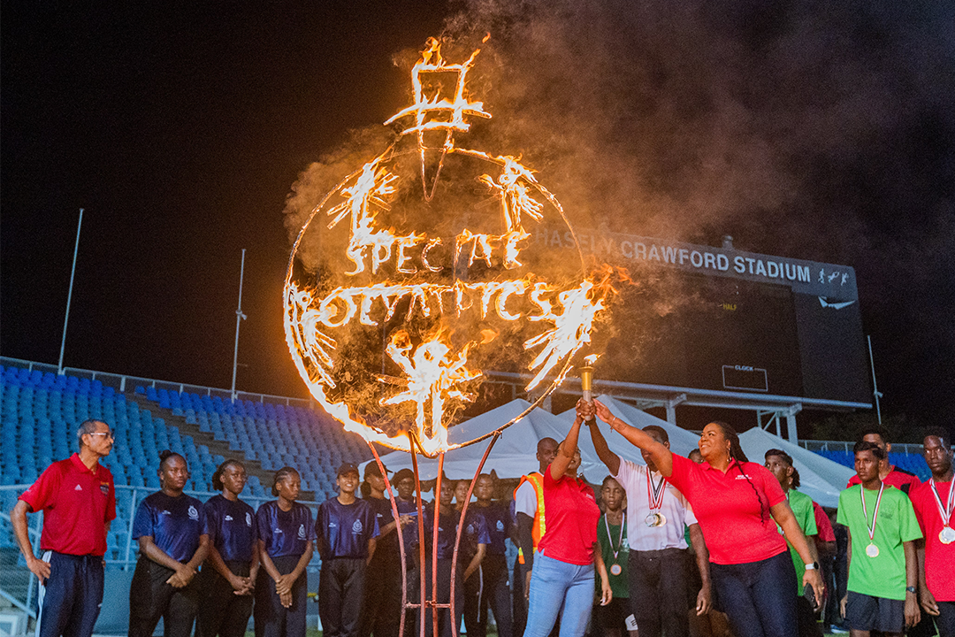 Athletes and sponsors light the SOTT torch