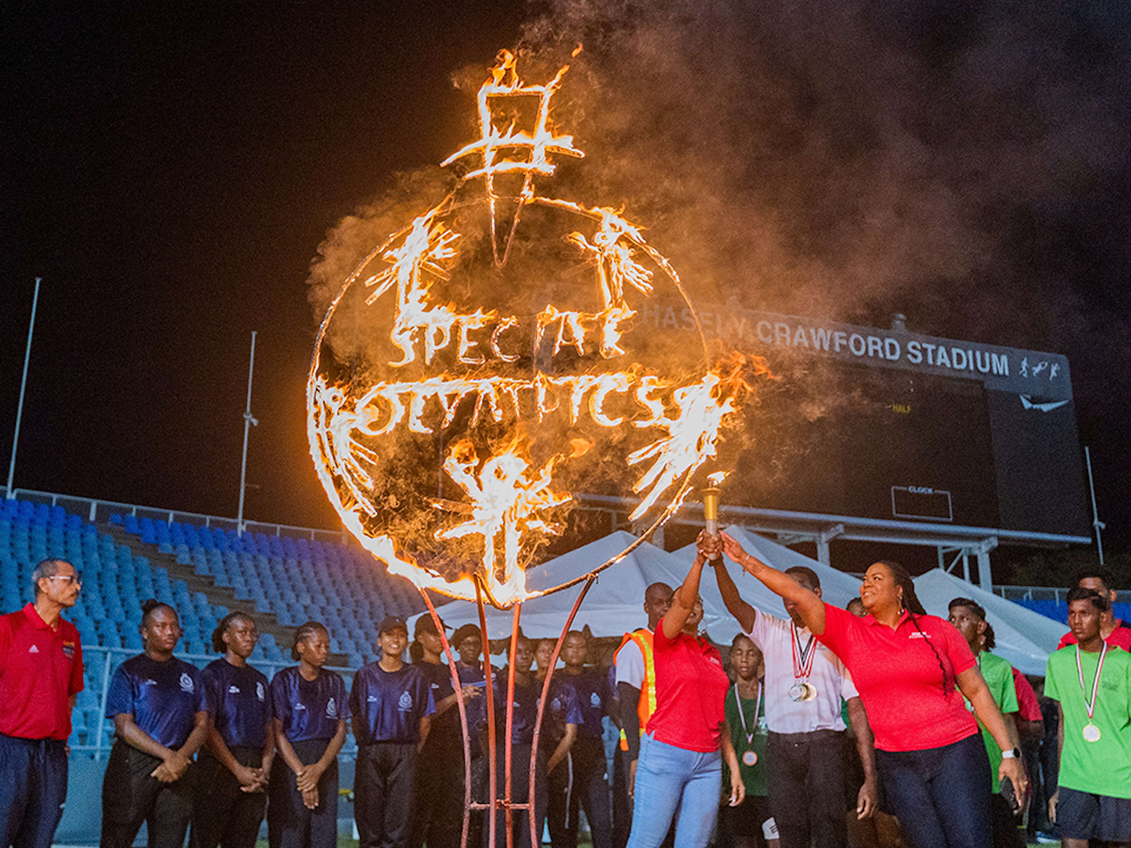 Athletes and sponsors light the SOTT torch
