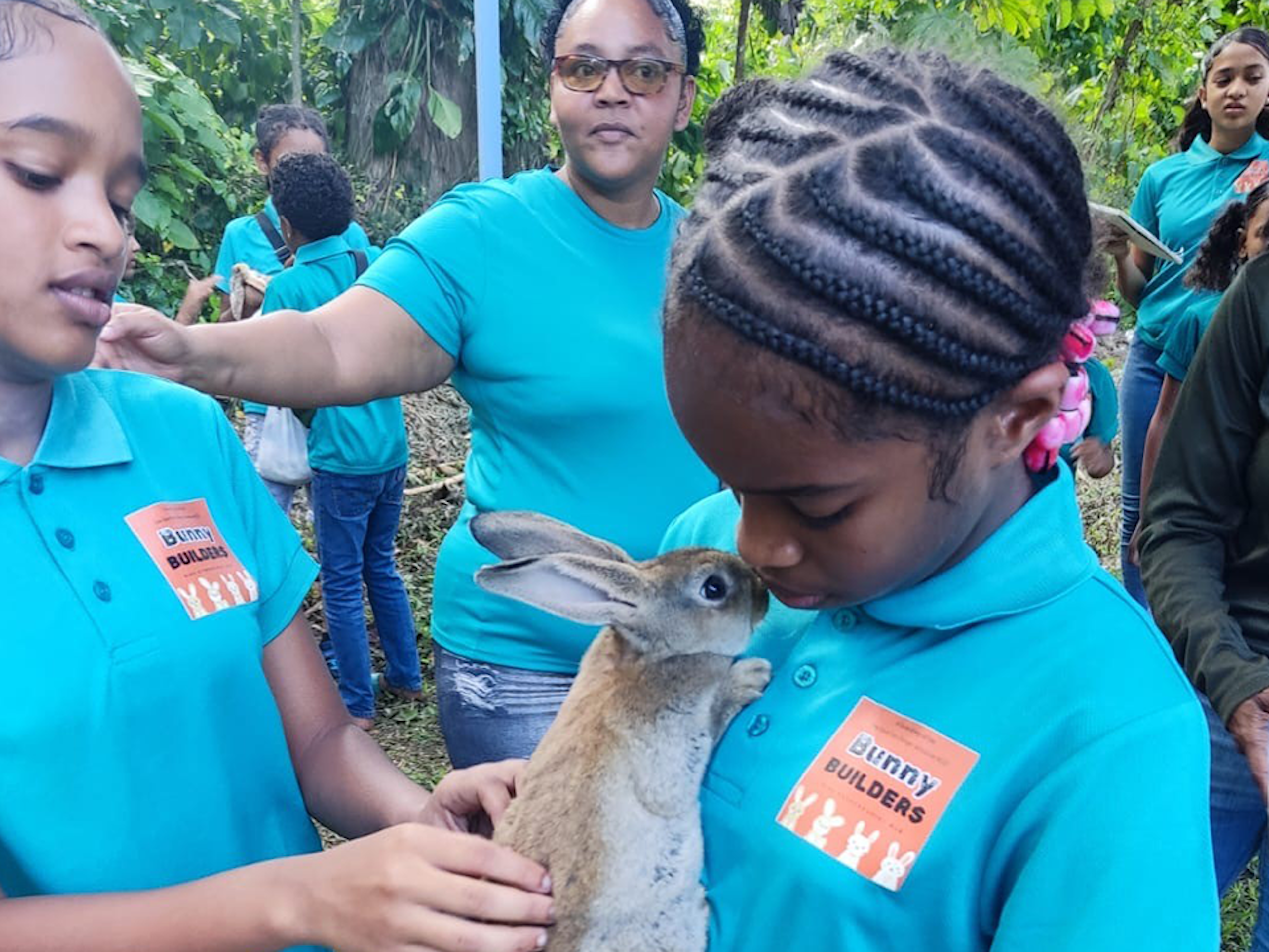 children hug bunny