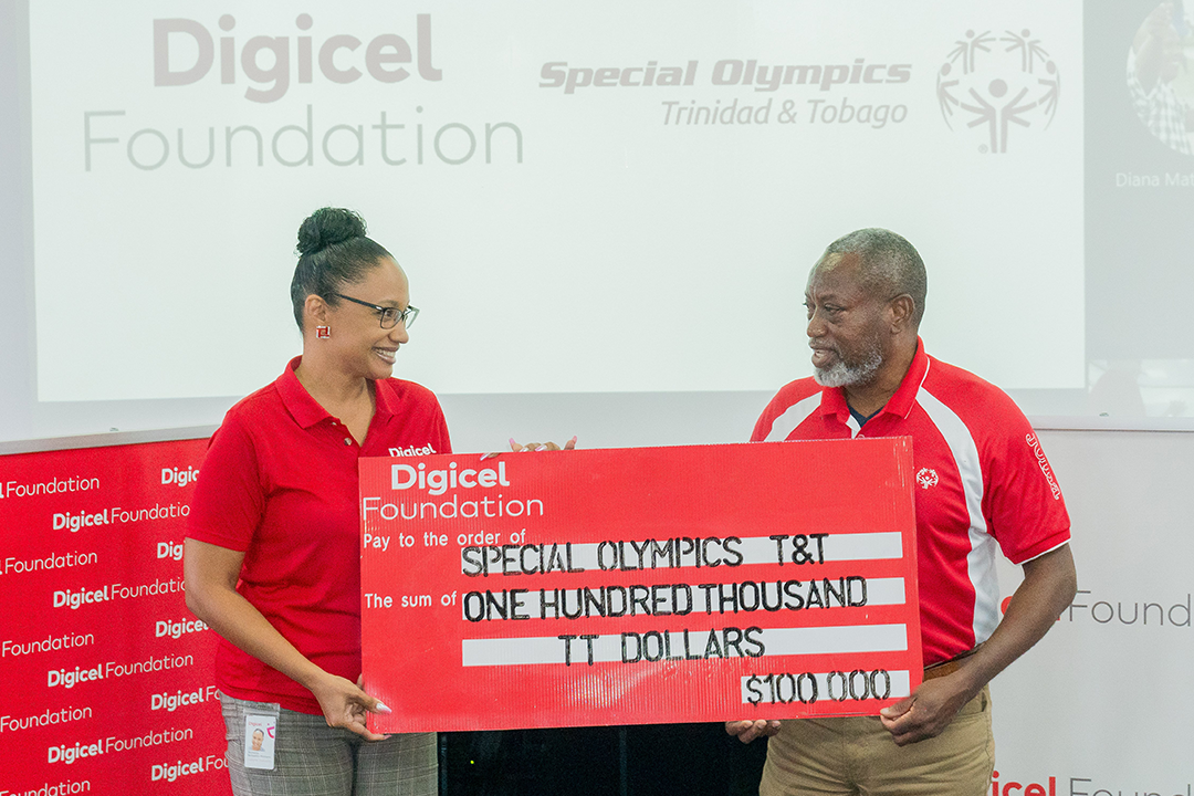 Digicel Foundation presenting cheque to SOTT