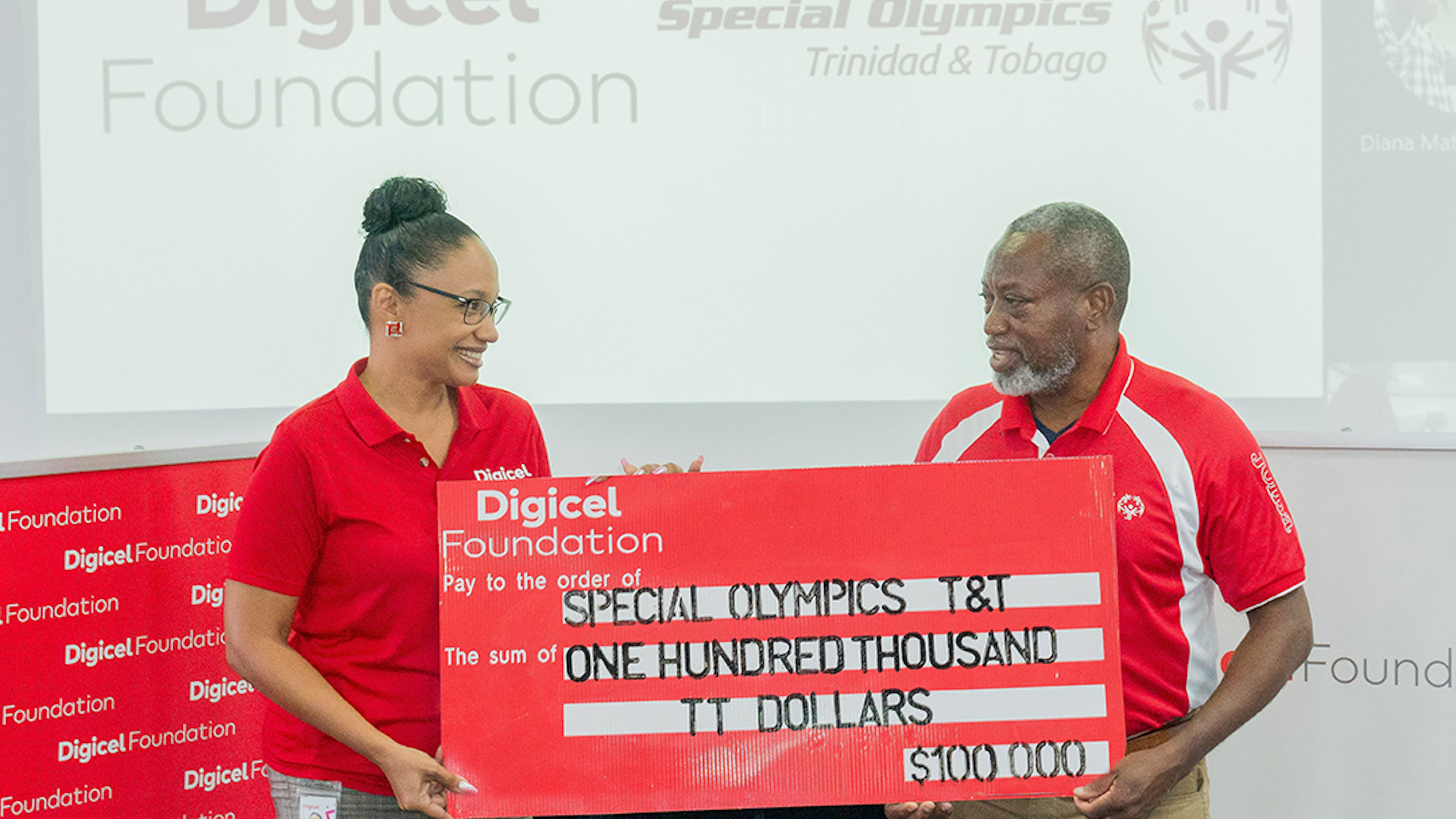 Digicel Foundation presenting cheque to SOTT
