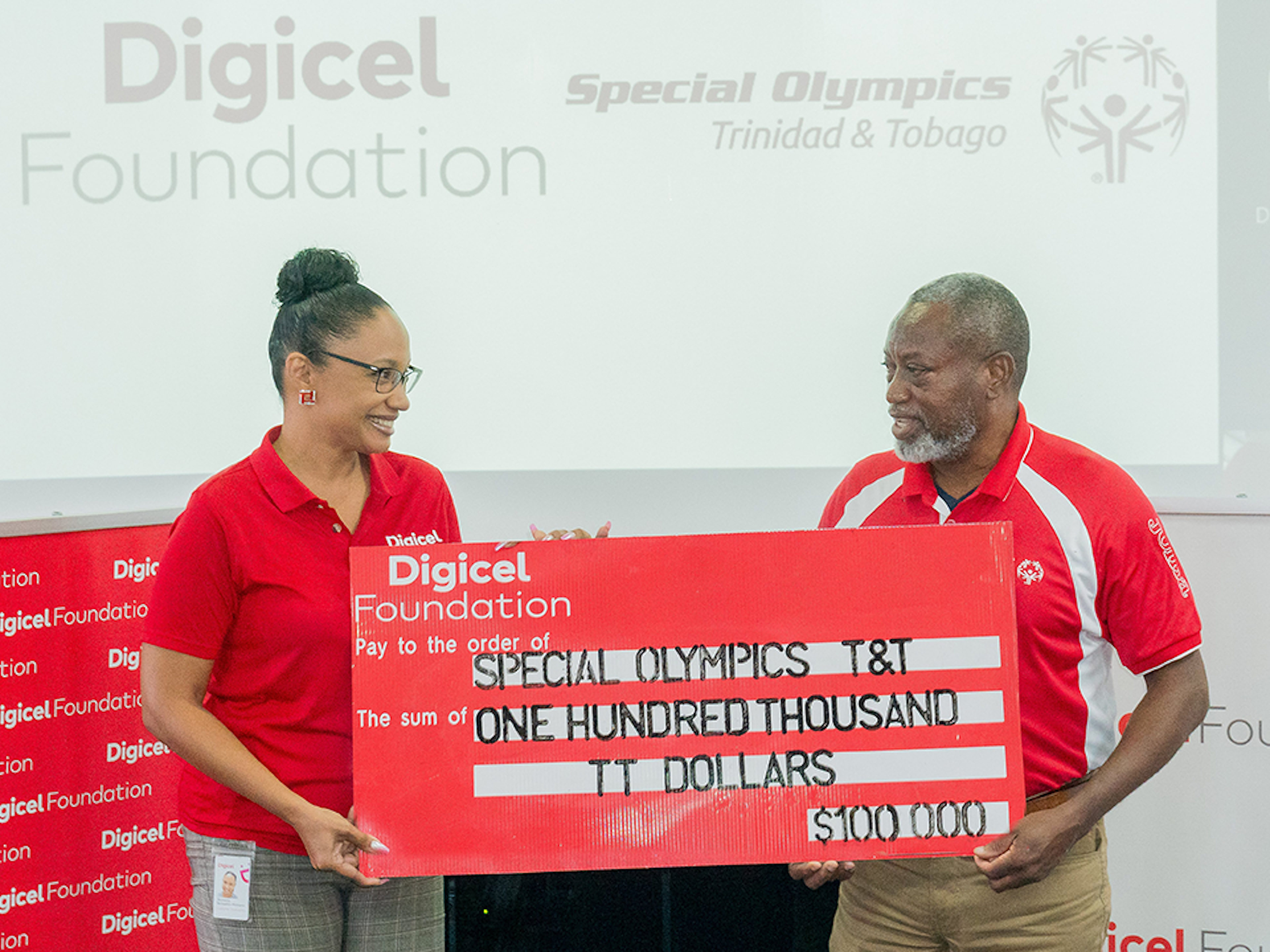 Digicel Foundation presenting cheque to SOTT