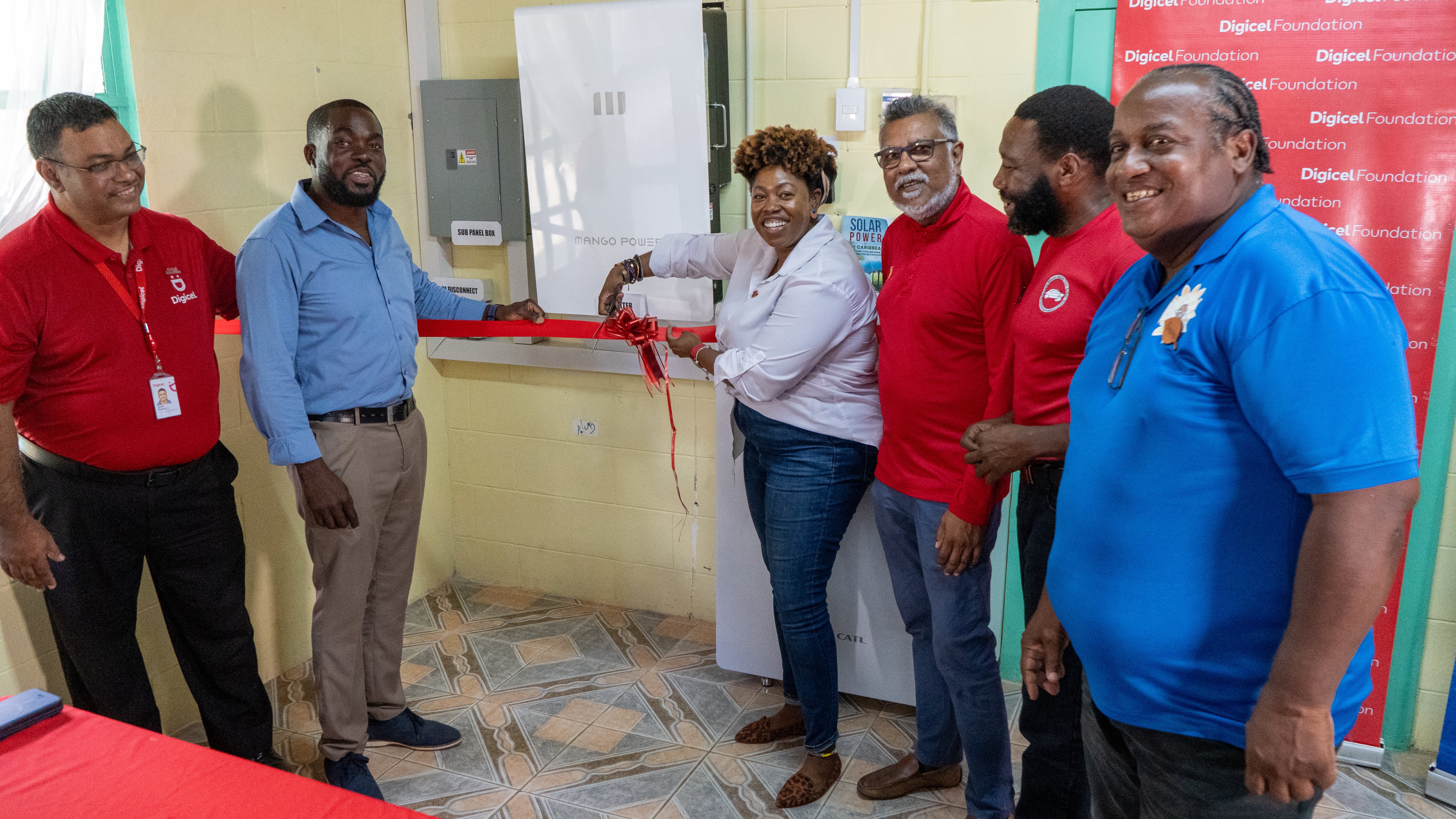 6 people cut red ribbon to solar power system