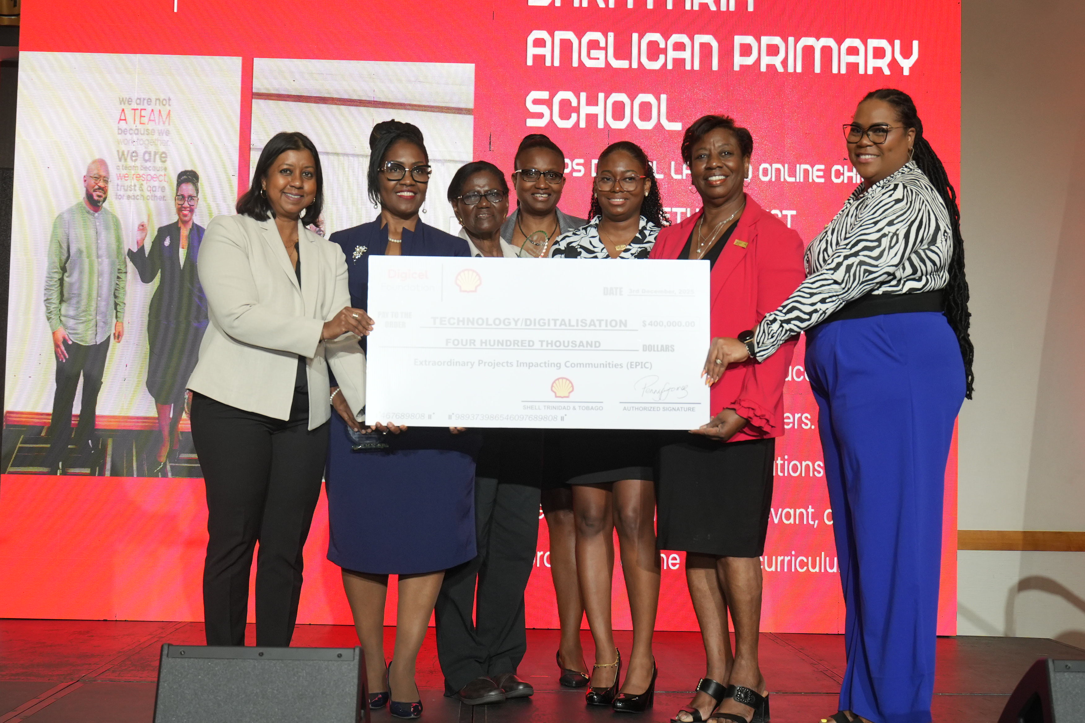 community group holding a big cheque