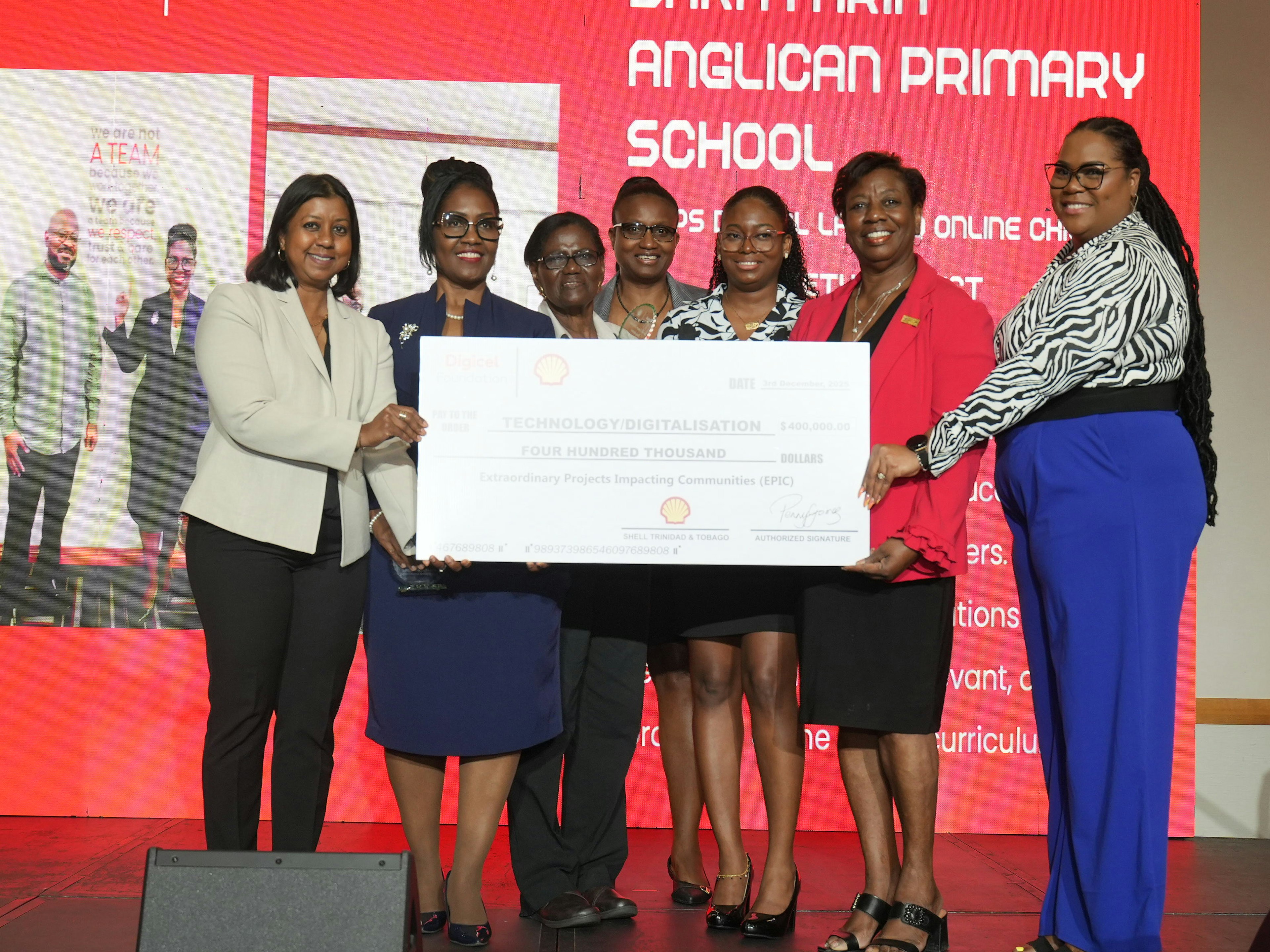 community group holding a big cheque