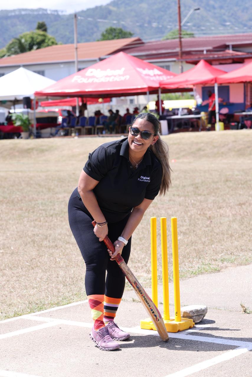digicel staff member playing cricket