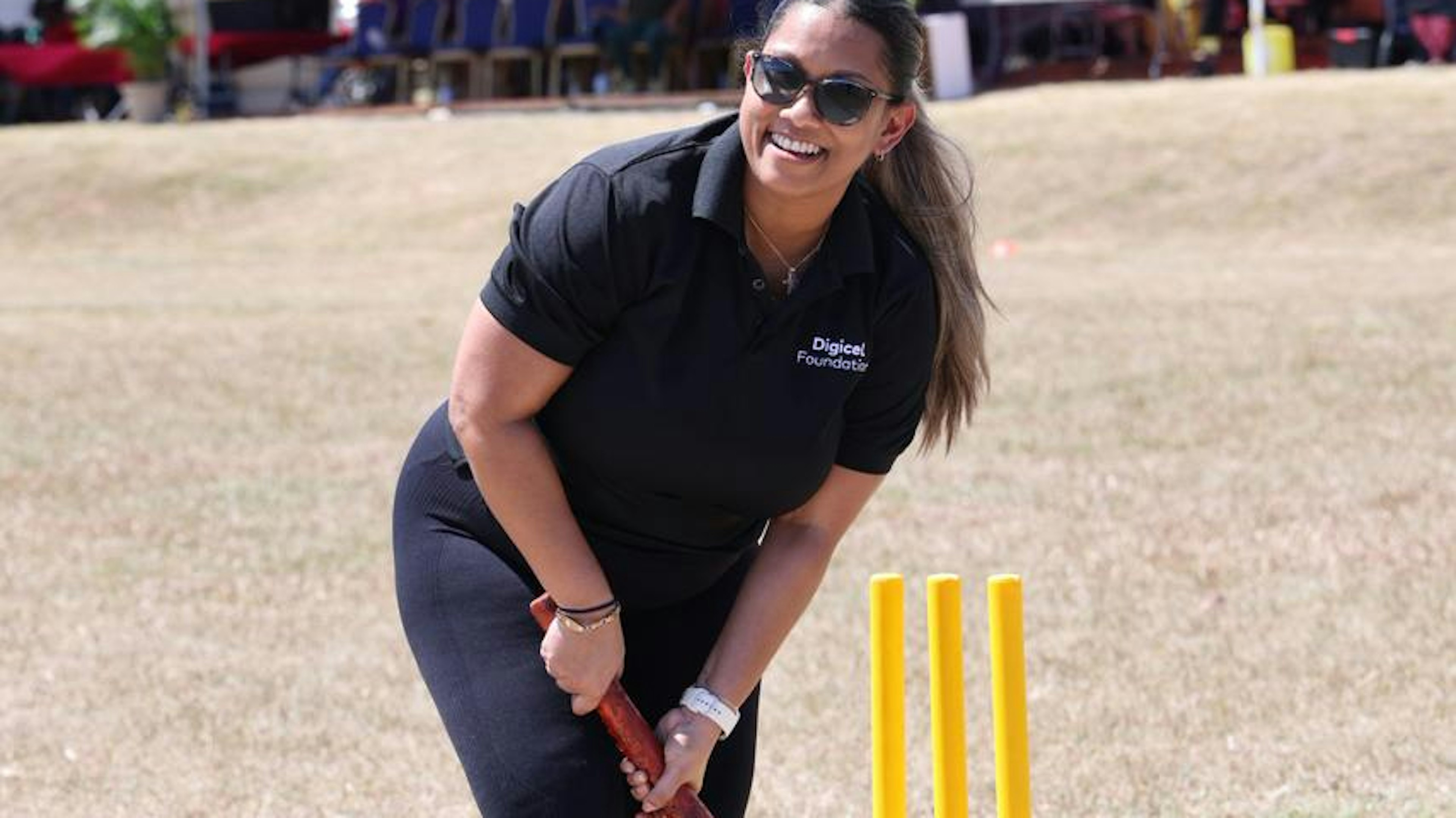 digicel staff member playing cricket