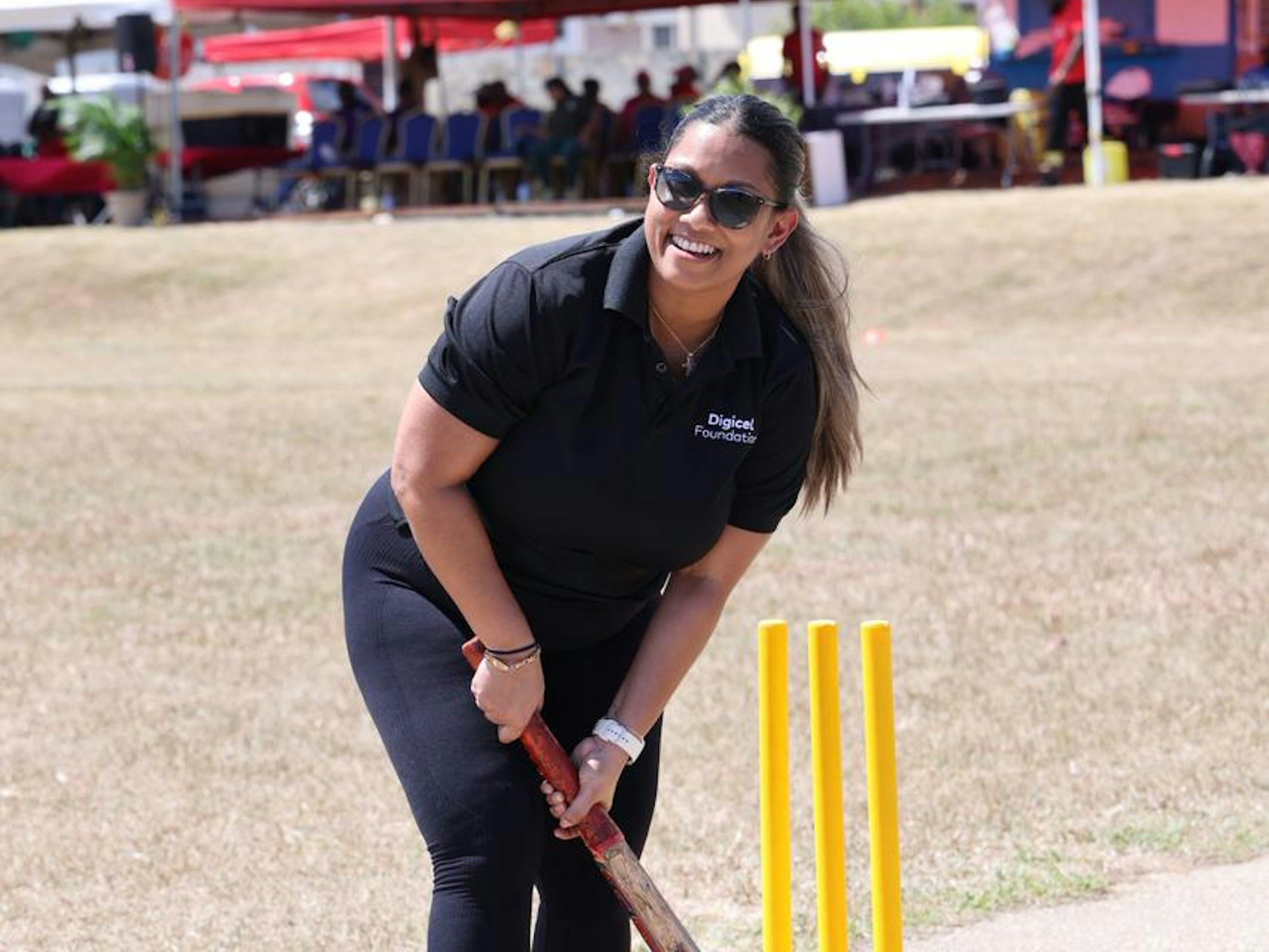 digicel staff member playing cricket
