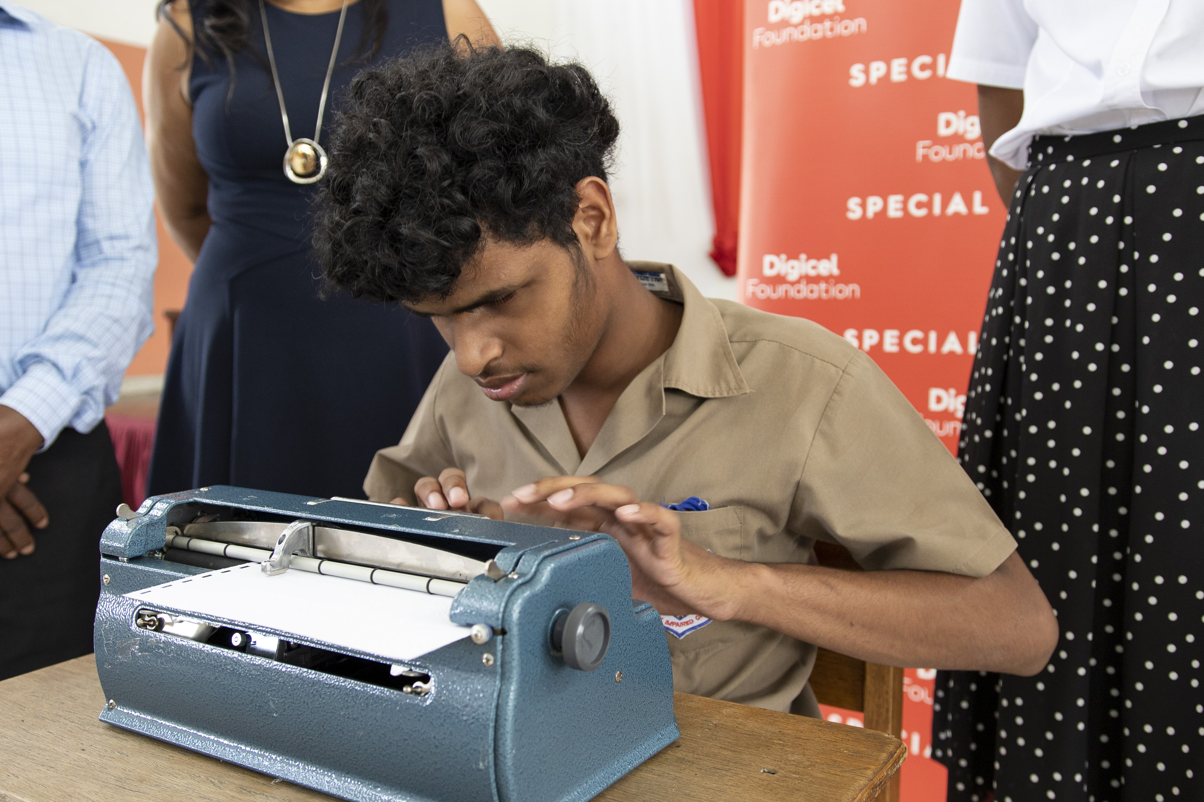 boy using braille
