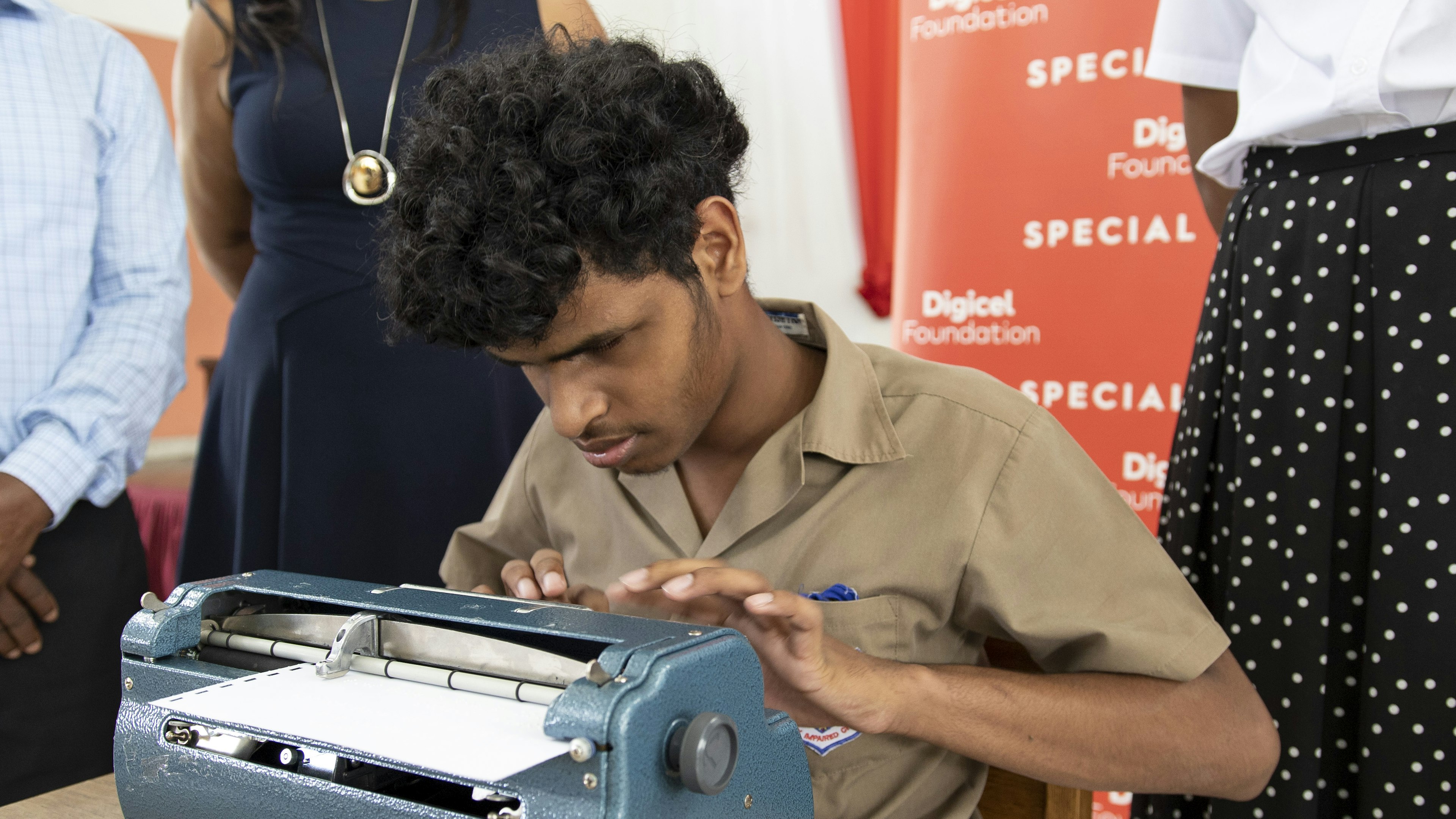 boy using braille