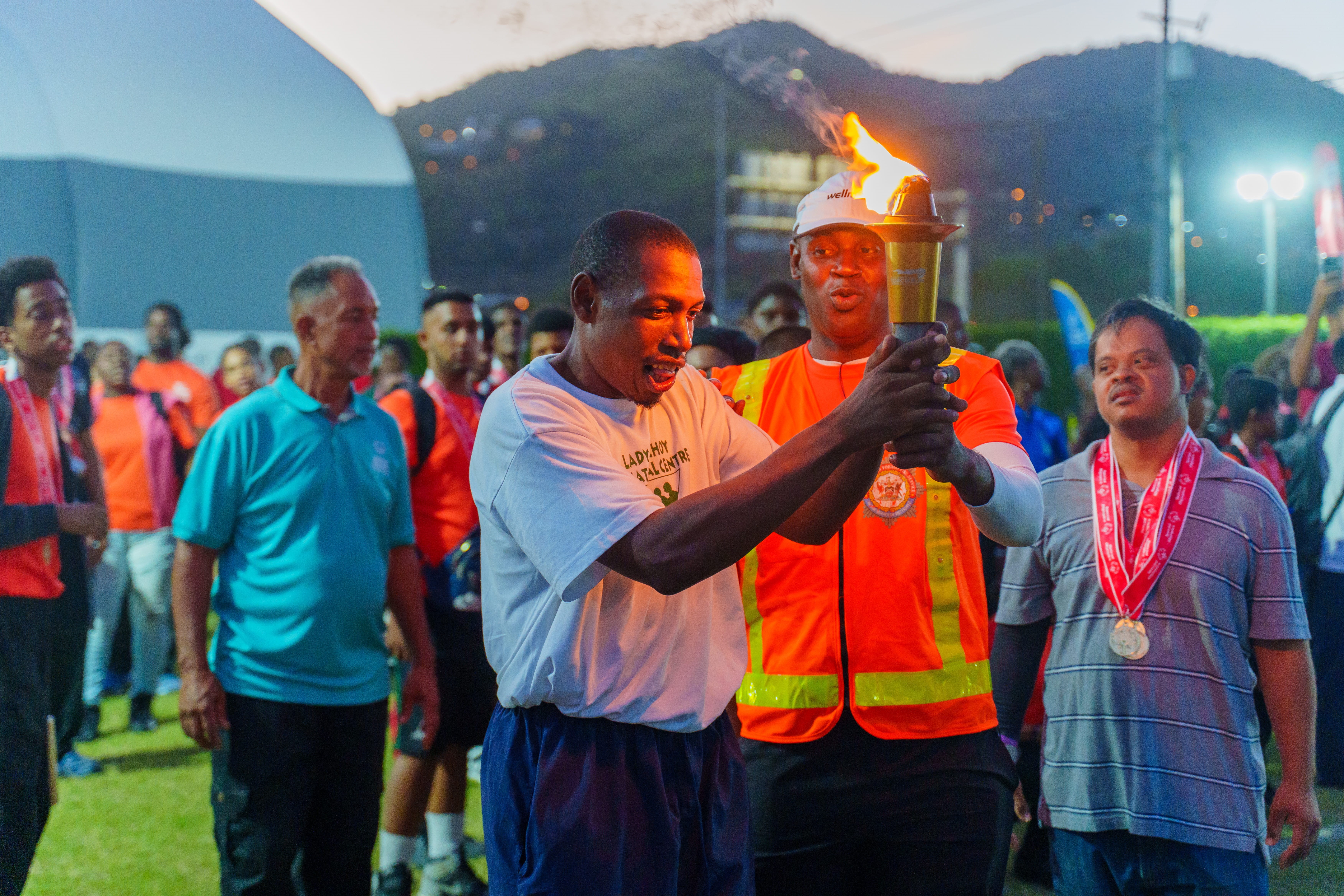 SOTT athlete holding the torch