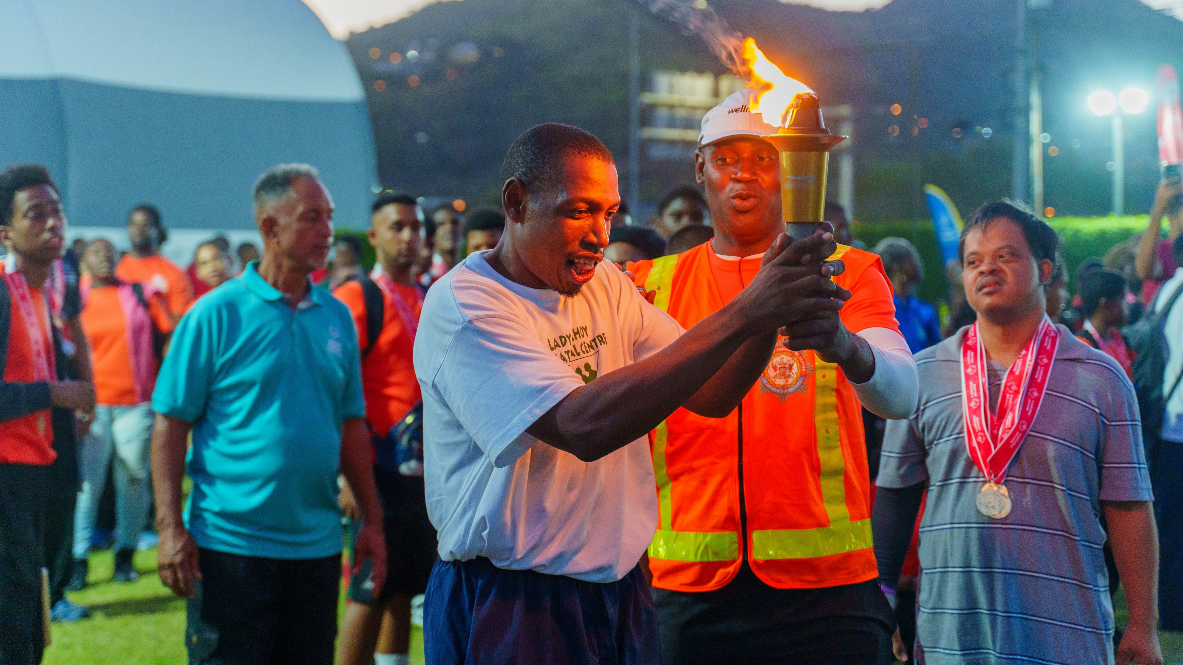 SOTT athlete holding the torch